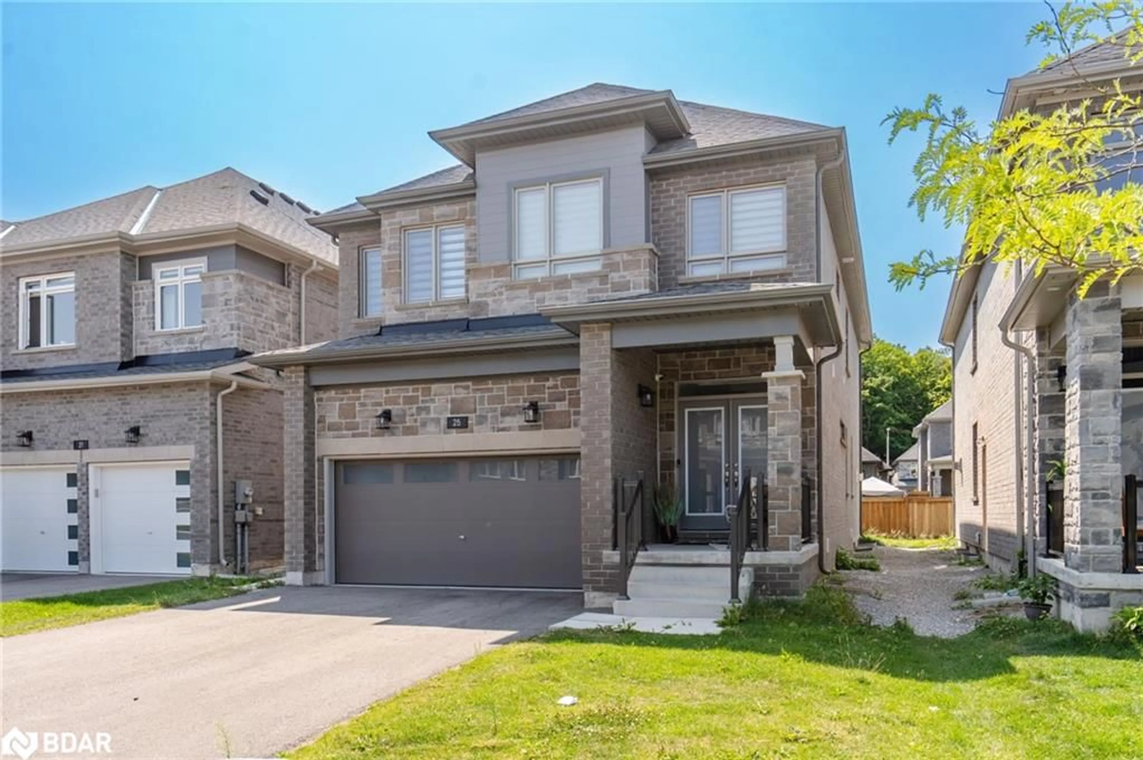 Home with brick exterior material, street for 25 Paddington Grove, Barrie Ontario L9J 0J3