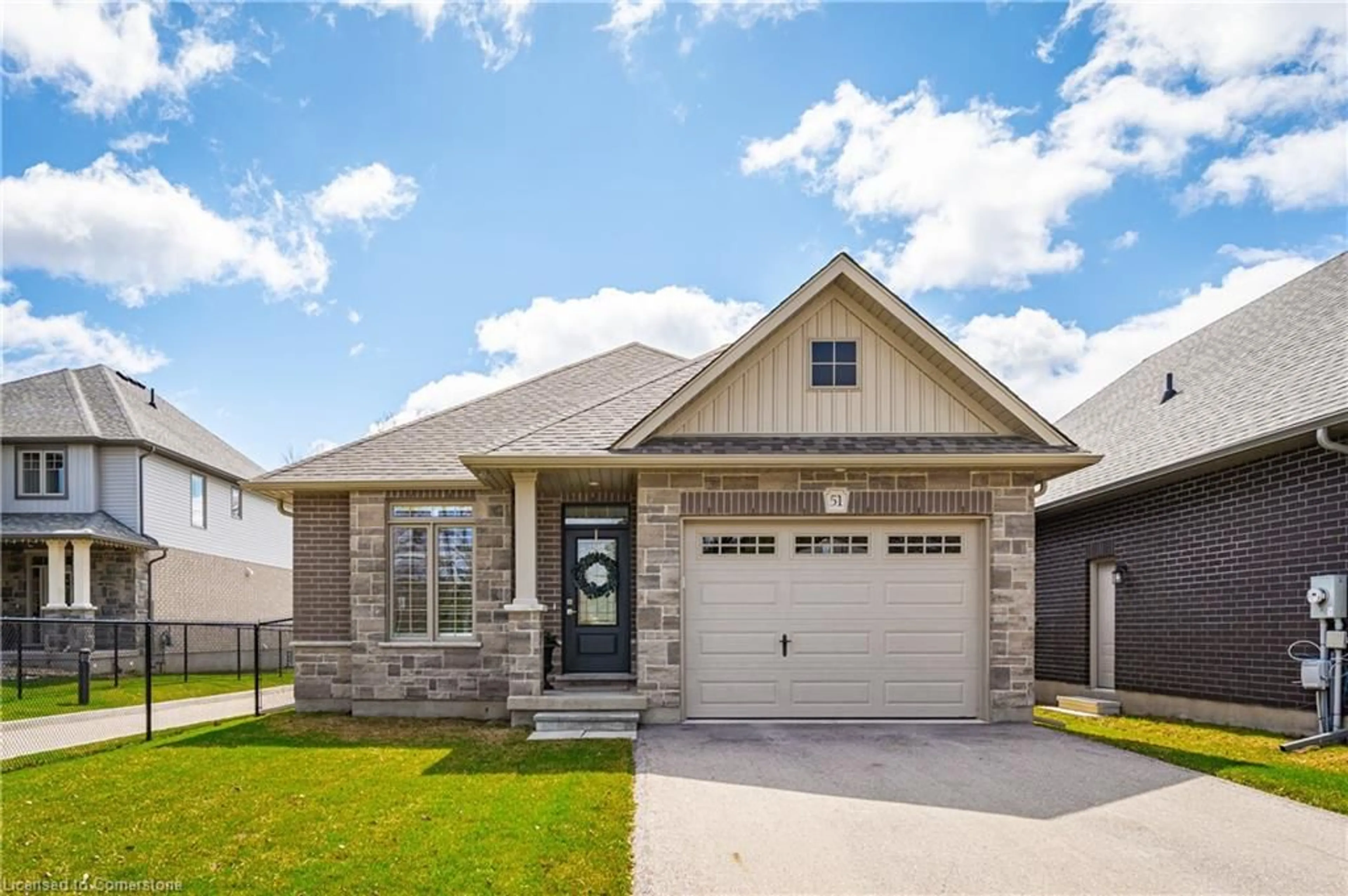 Home with brick exterior material, street for 51 Murray Dr, Elora Ontario N0B 1S0