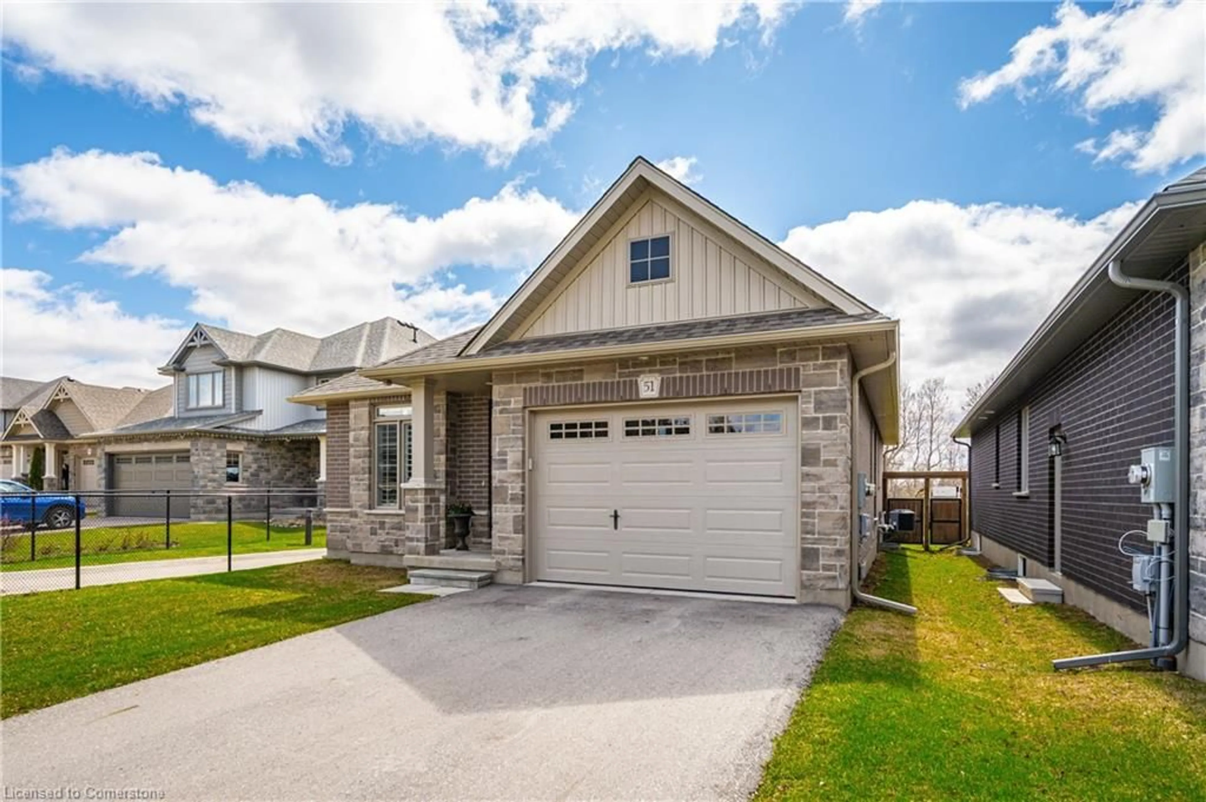 Home with brick exterior material, street for 51 Murray Dr, Elora Ontario N0B 1S0