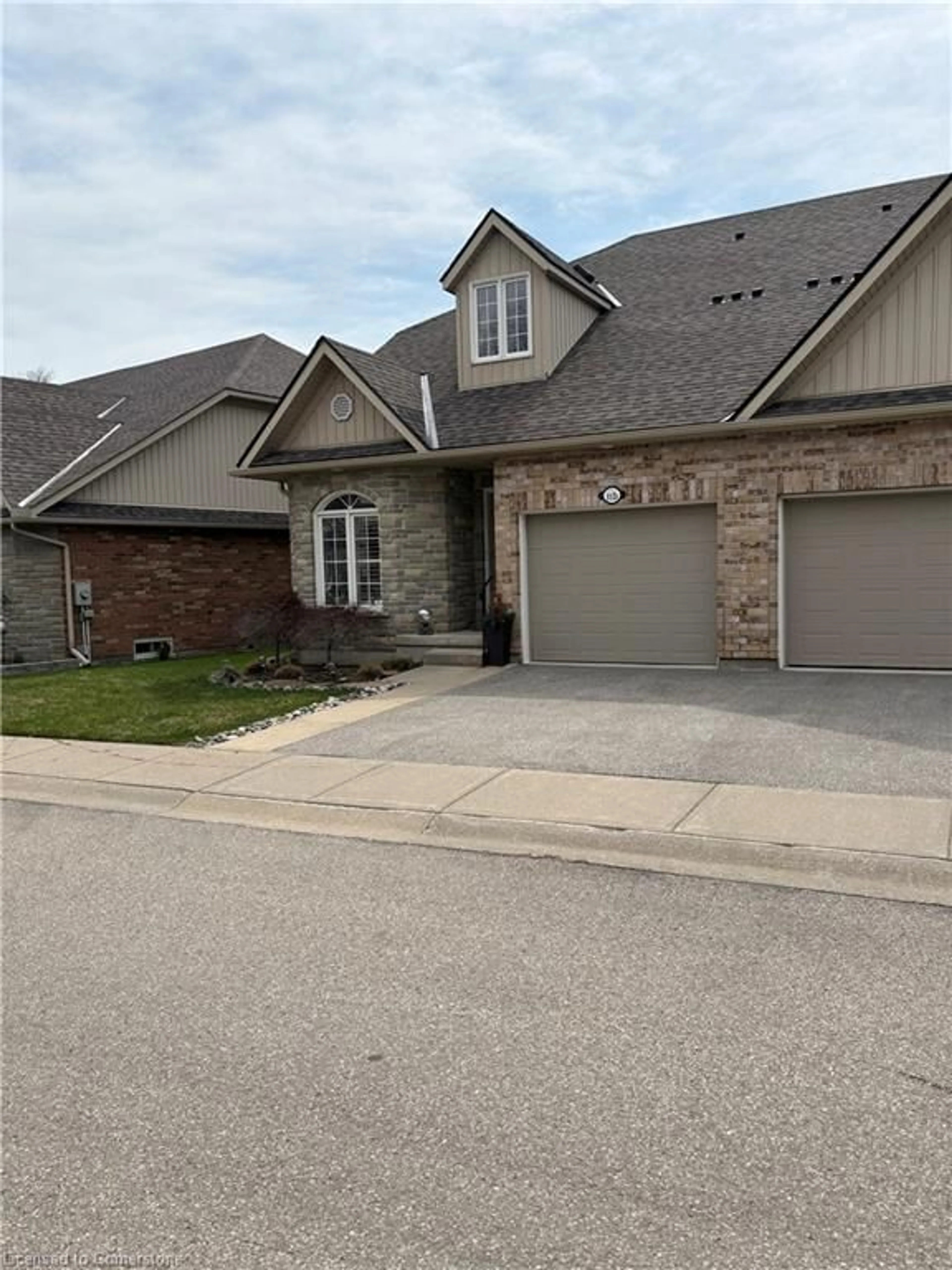 Home with brick exterior material, street for 350 Doon Valley Dr #11D, Kitchener Ontario N2P 2M9