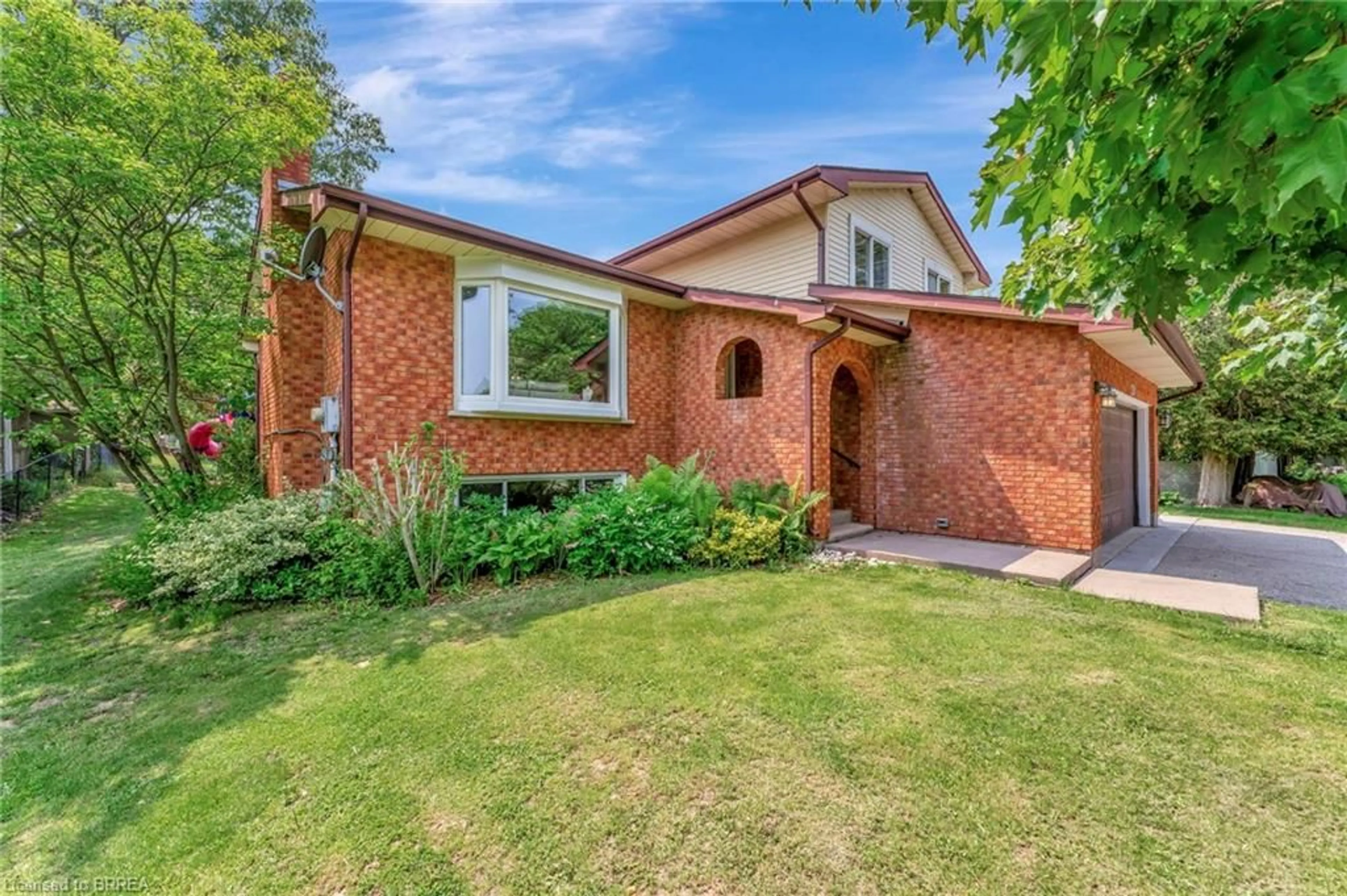 Home with brick exterior material, street for 129 Main St, St. George Ontario N0E 1N0