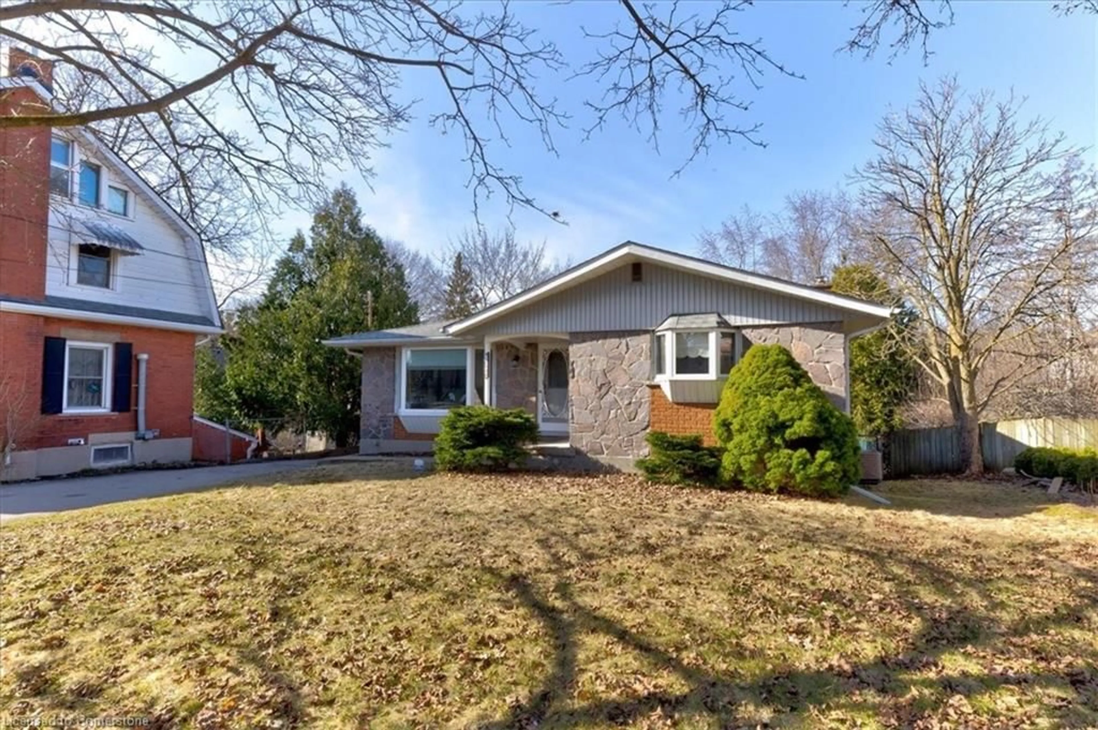 Home with vinyl exterior material, street for 268 Exhibition St, Guelph Ontario N1H 4R7