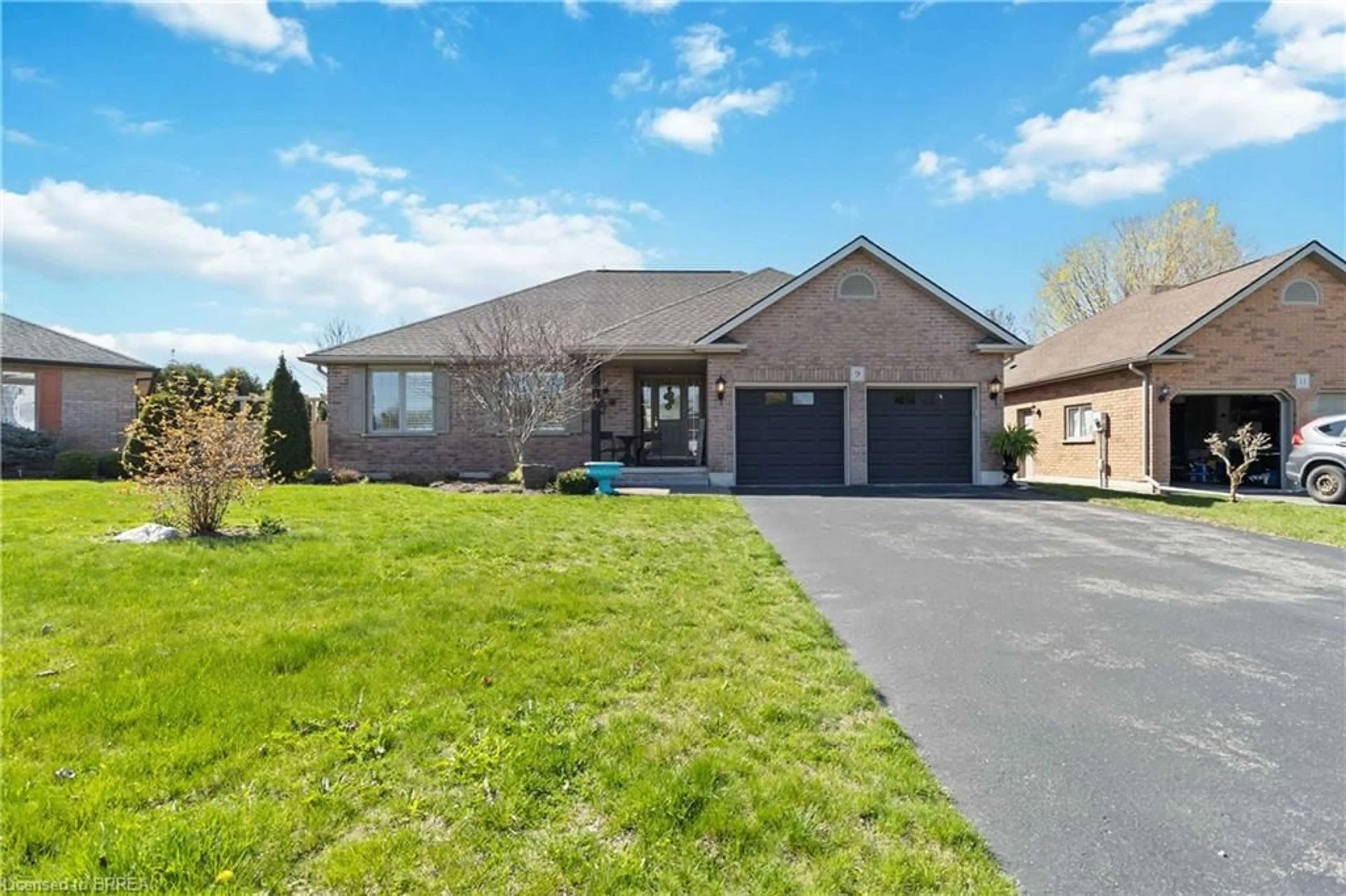 Home with brick exterior material, street for 9 Greeneagle Dr, Tillsonburg Ontario N4G 5V6
