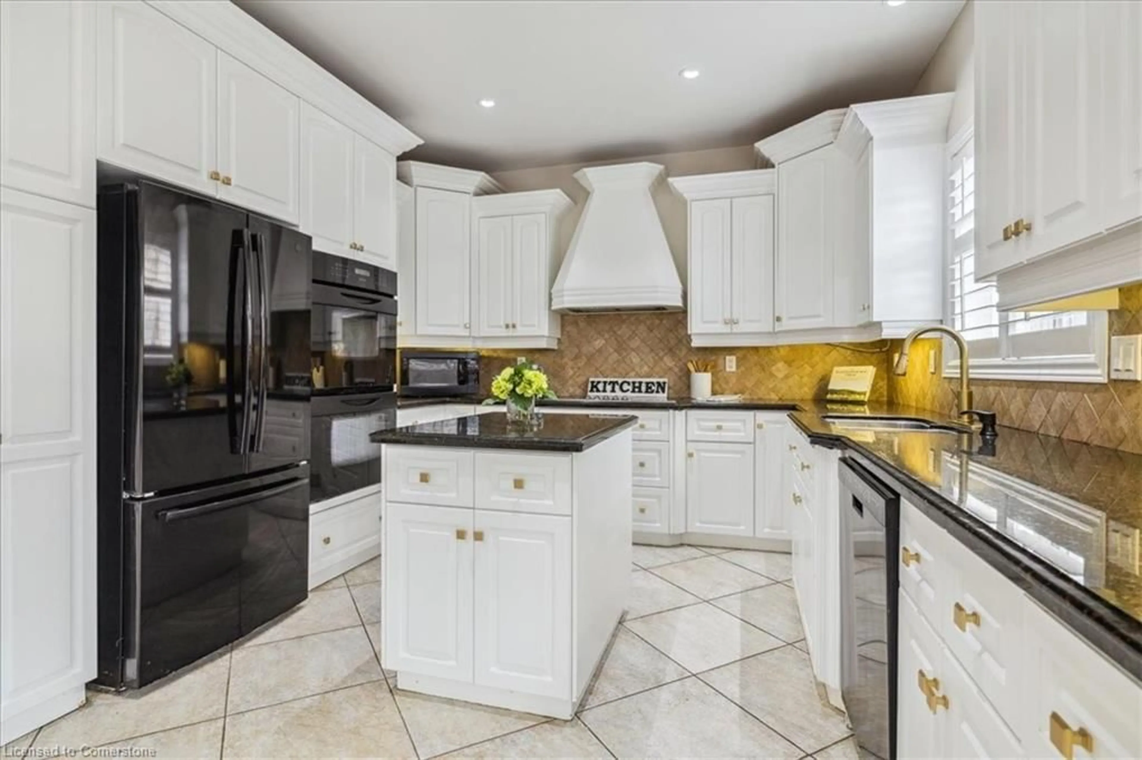 Open concept kitchen, ceramic/tile floor for 82 Dulgaren St, Hamilton Ontario L8W 3Y8