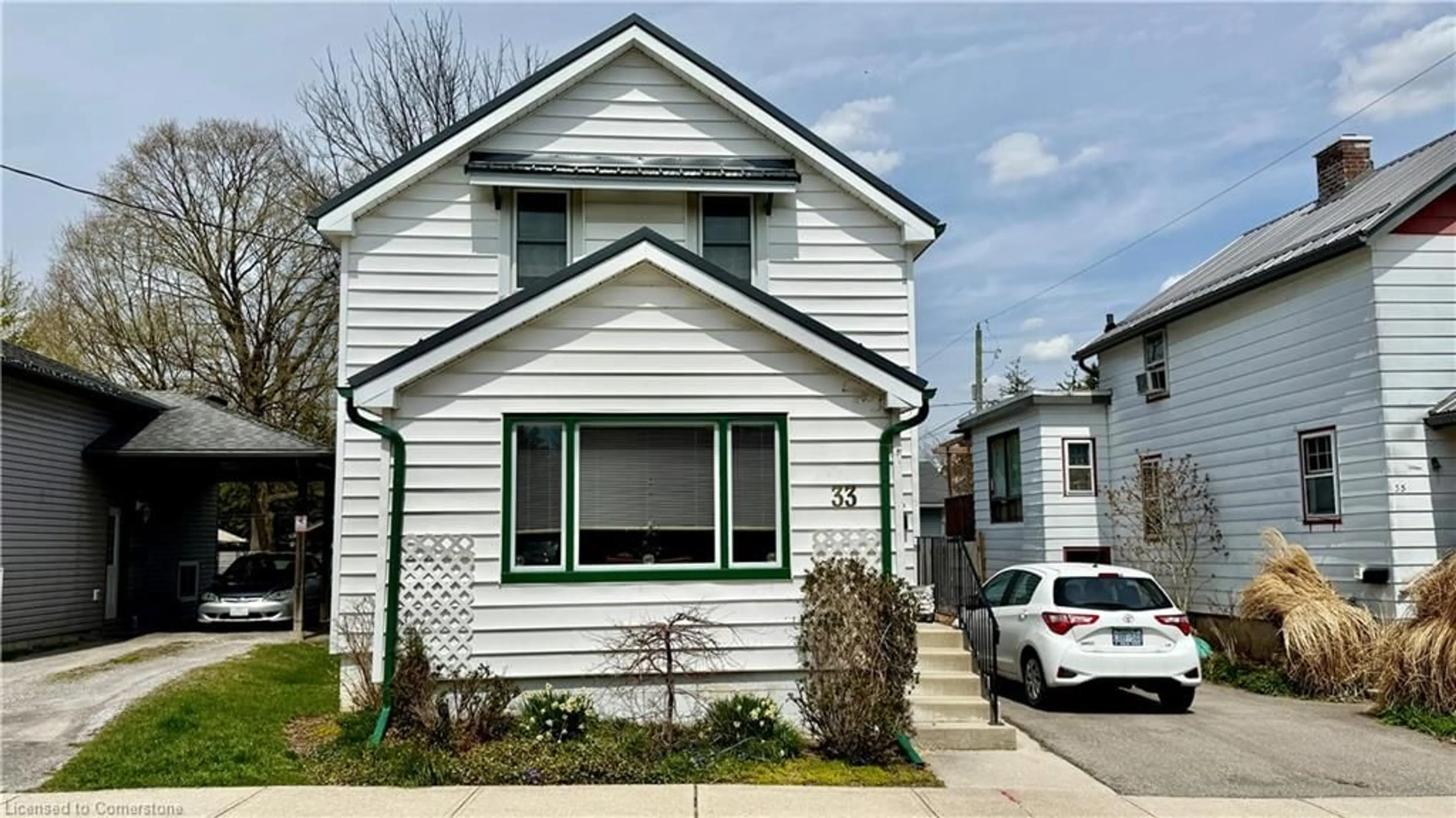 Home with vinyl exterior material, street for 33 Patterson St, Simcoe Ontario N3Y 1J1