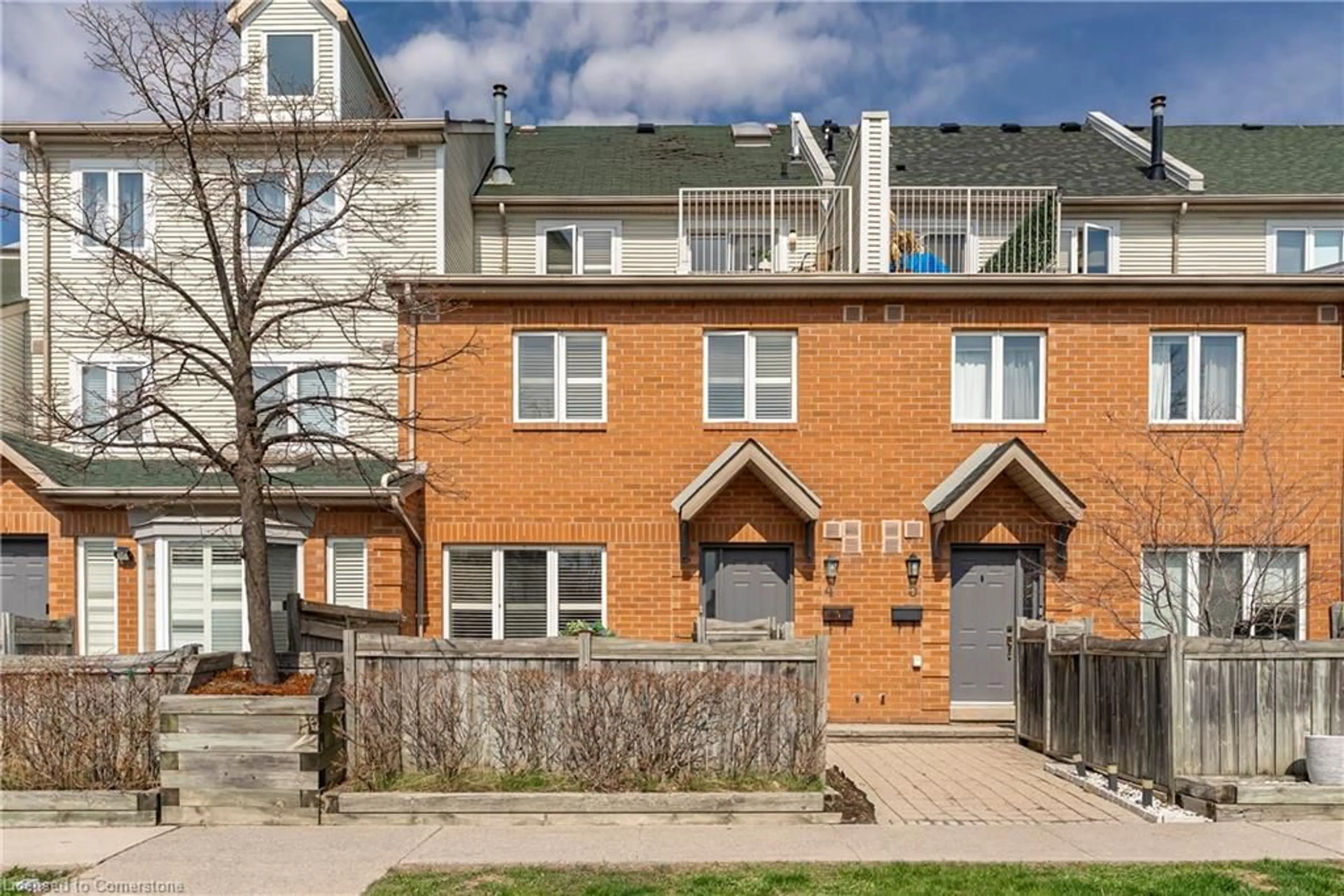 Home with brick exterior material, street for 1241 Parkwest Pl #4, Mississauga Ontario L5E 3J3
