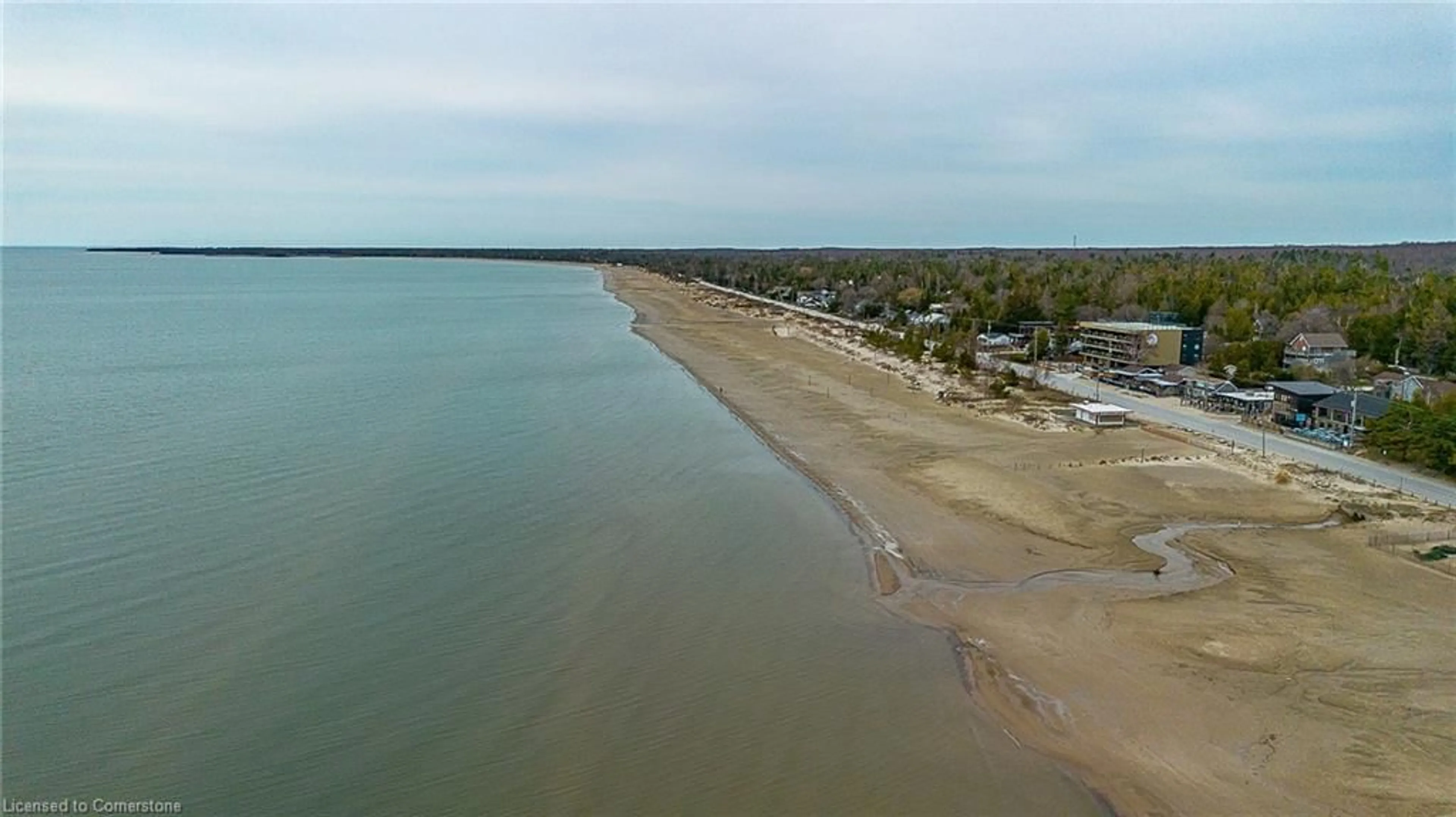 A pic from outside/outdoor area/front of a property/back of a property/a pic from drone, water/lake/river/ocean view for 4 Toronto Ave Ave, Sauble Beach Ontario N0H 2G0