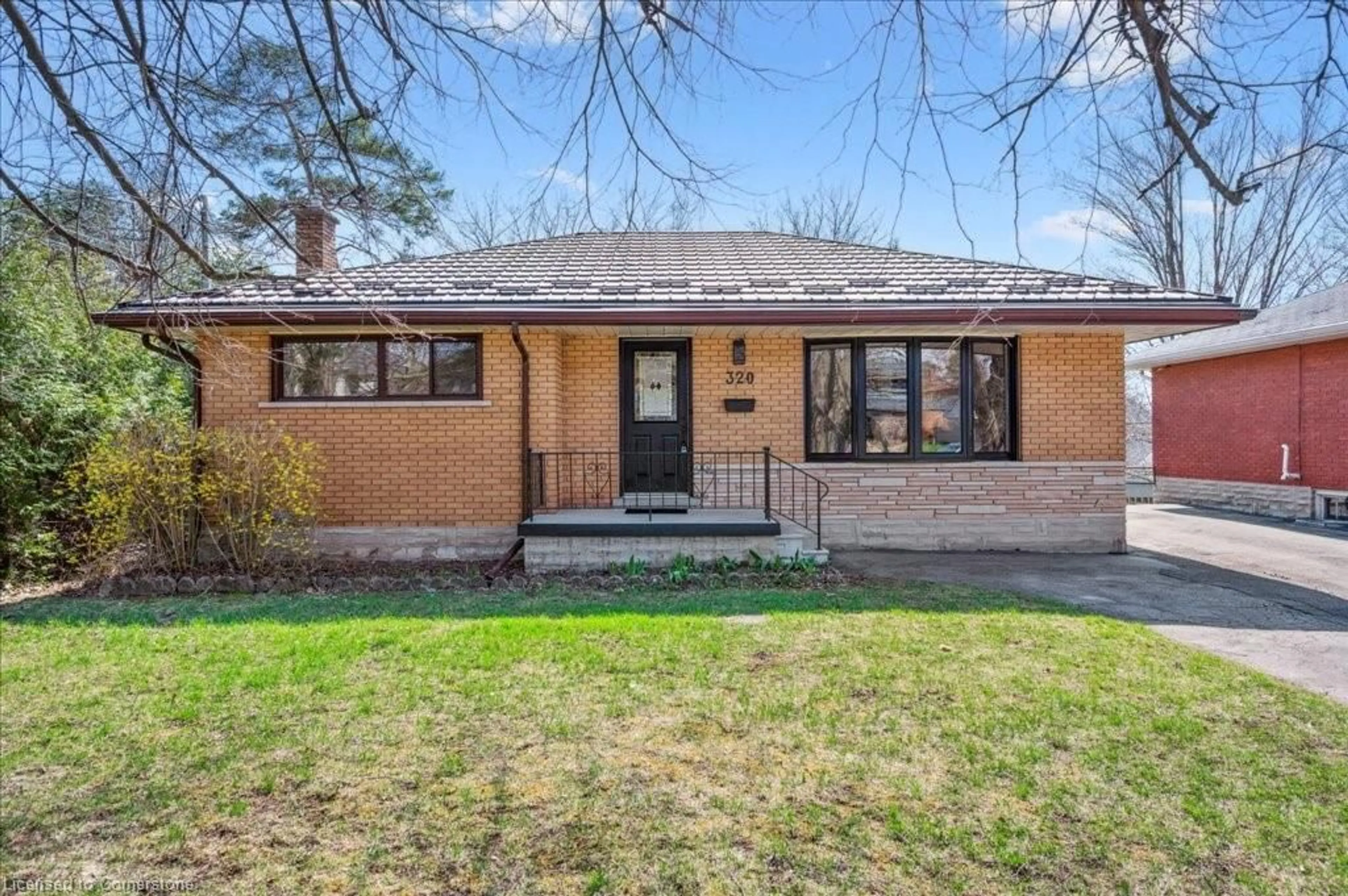 Home with brick exterior material, street for 320 Victoria Rd, Guelph Ontario N1E 5J4