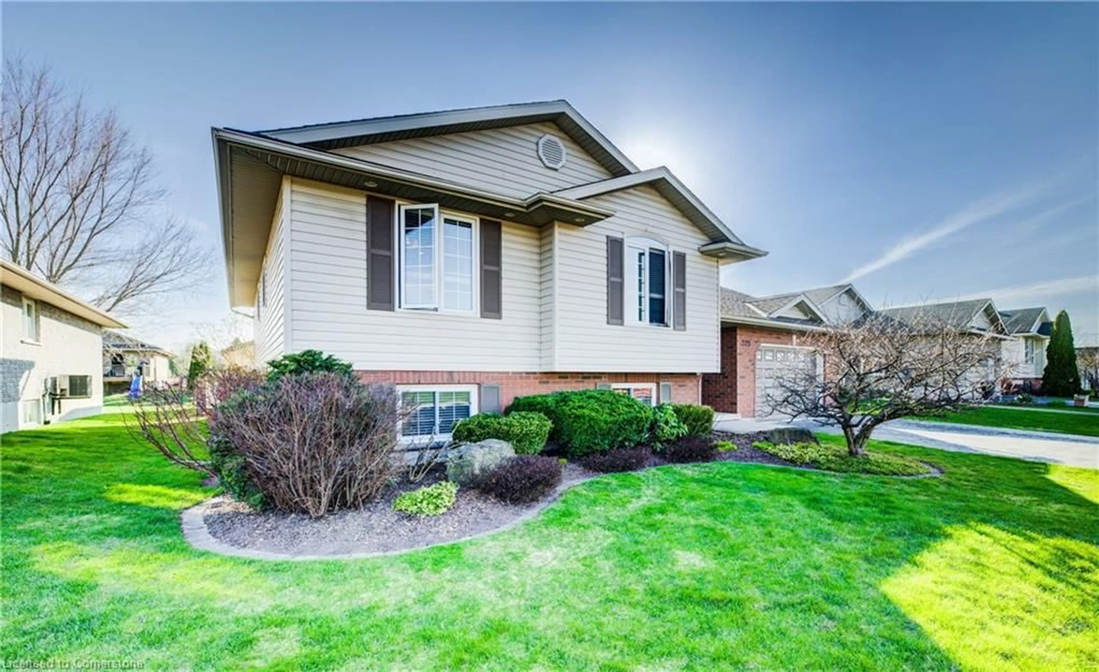 Home with vinyl exterior material, street for 225 Wendy's Lane, Mount Forest Ontario N0G 2L2