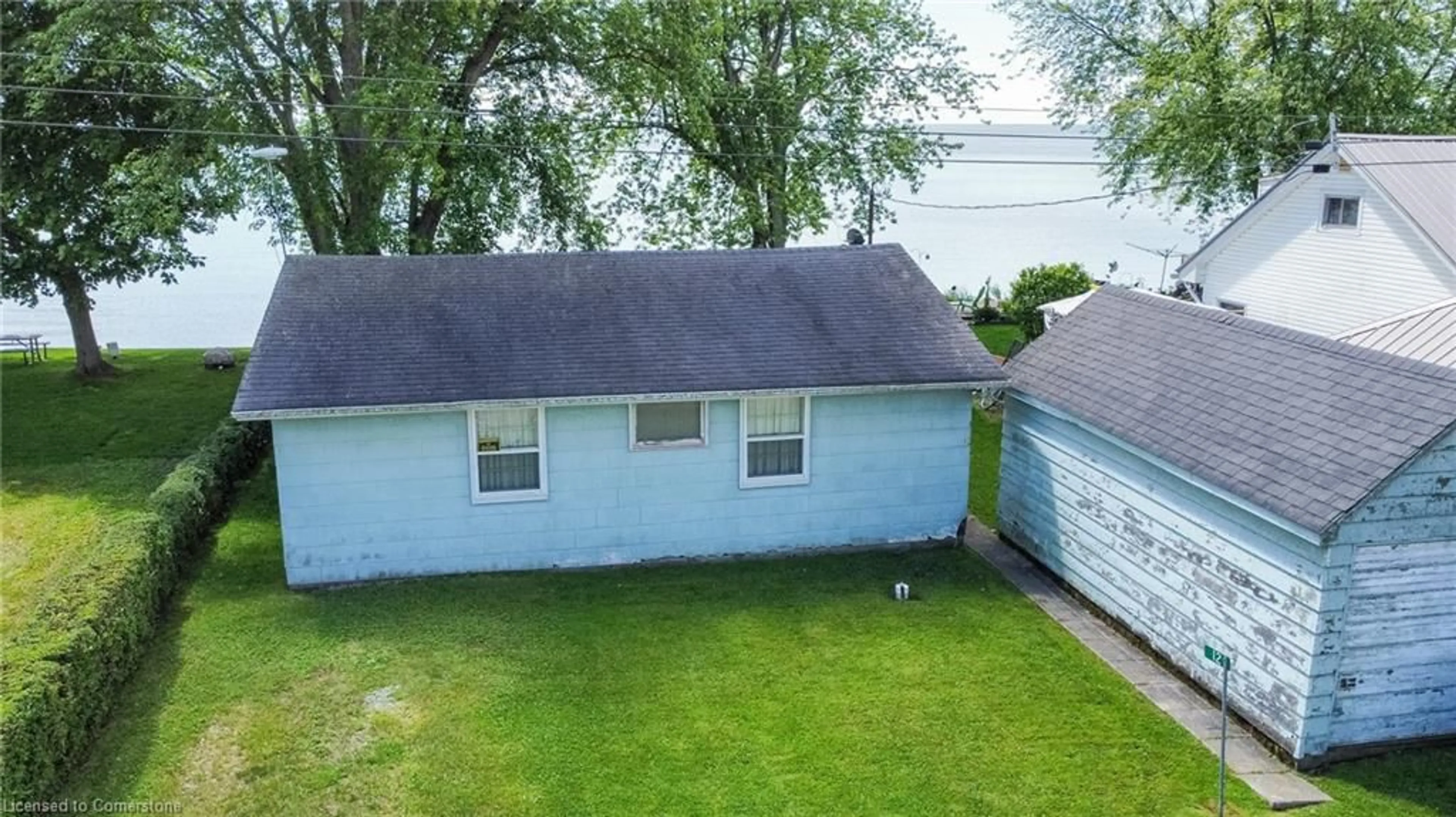 A pic from outside/outdoor area/front of a property/back of a property/a pic from drone, water/lake/river/ocean view for 12 Smelsers Cove Ln, Selkirk Ontario N0A 1P0