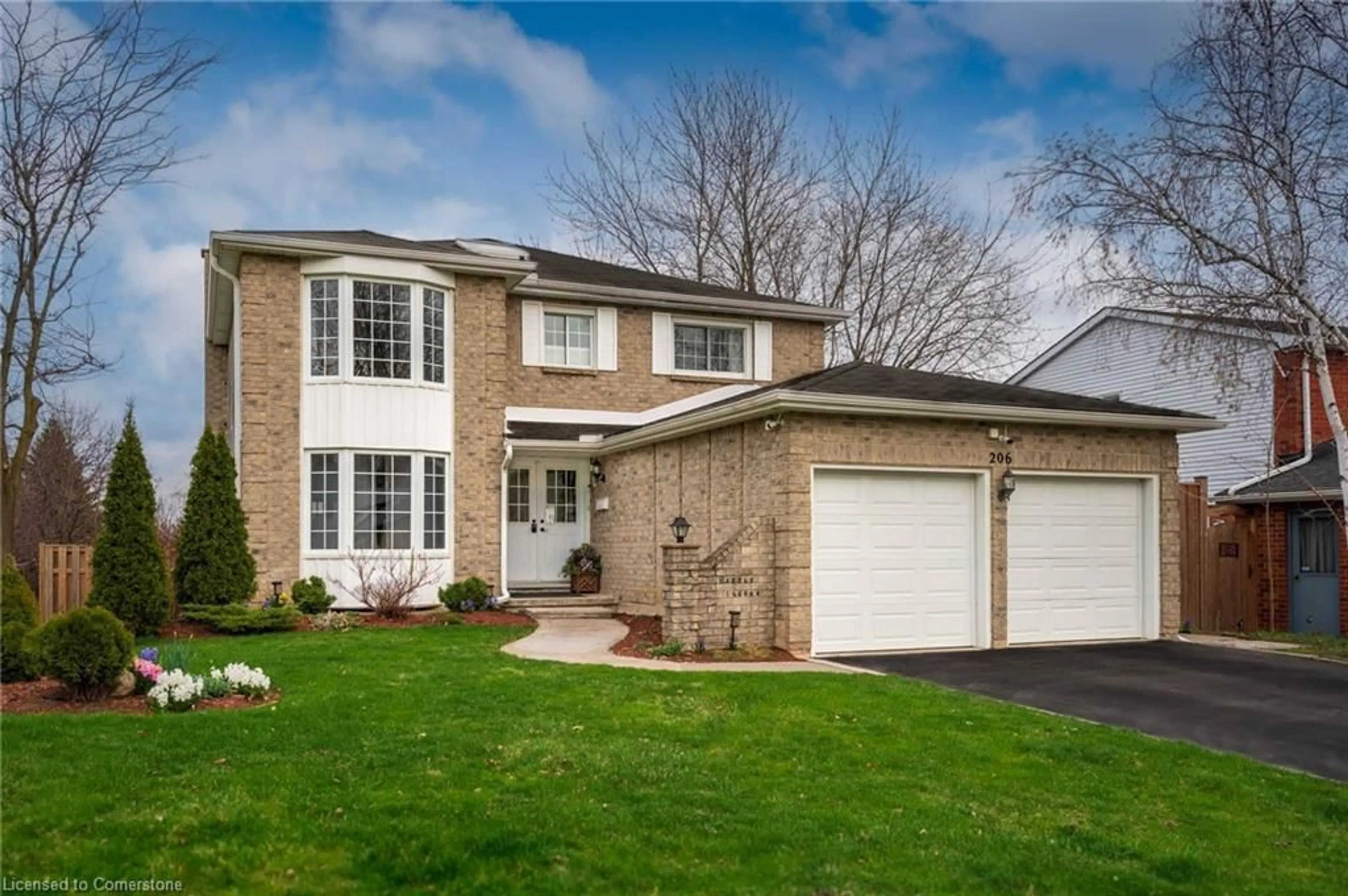 Home with brick exterior material, street for 206 Westvale Dr, Waterloo Ontario N2T 1C3