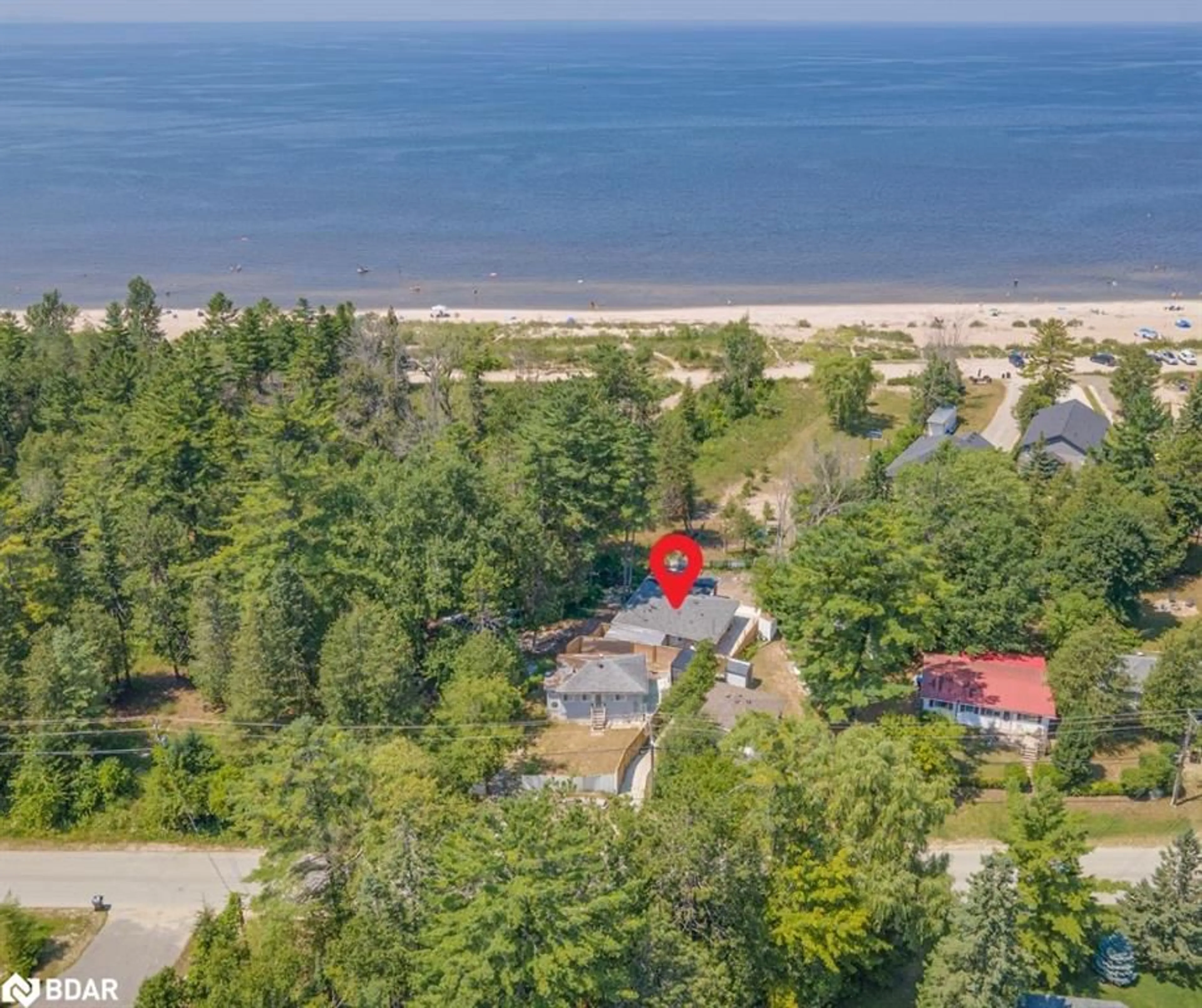 A pic from outside/outdoor area/front of a property/back of a property/a pic from drone, water/lake/river/ocean view for 54 Homewood Ave, Wasaga Beach Ontario L9Z 2M2