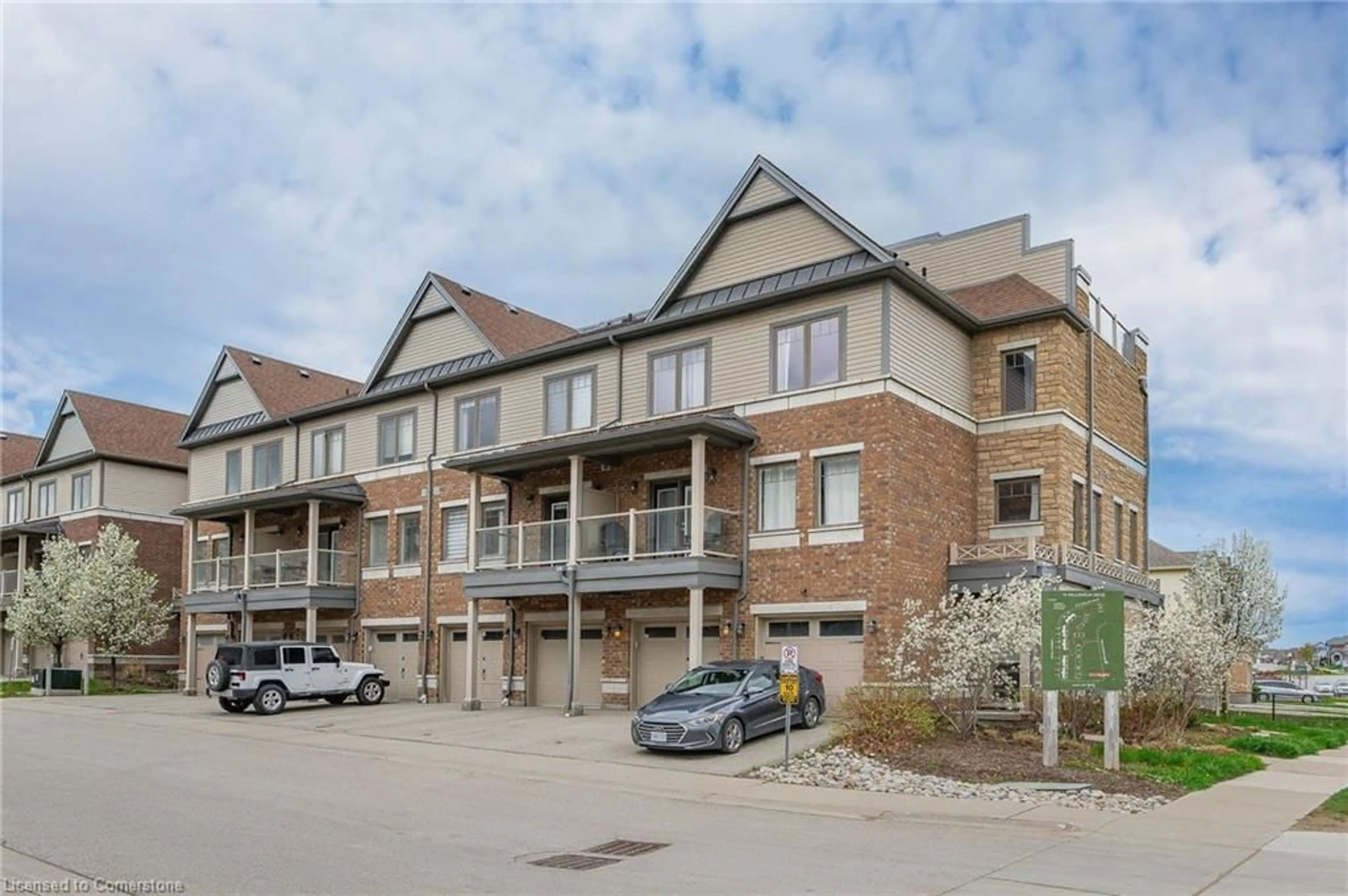 A pic from outside/outdoor area/front of a property/back of a property/a pic from drone, unknown for 70 Willowrun Dr #A2, Kitchener Ontario N2A 0J3