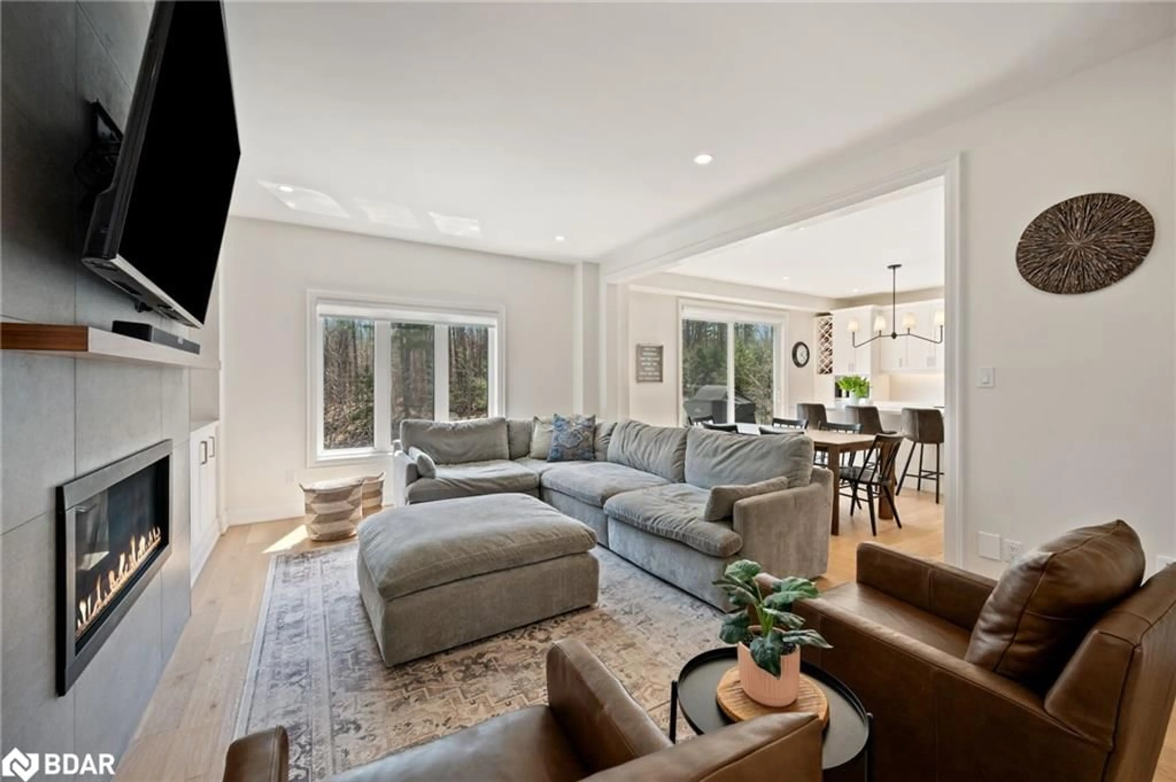 Living room with furniture, unknown for 61 Muirfield Drive Dr, Barrie Ontario L4N 6J9