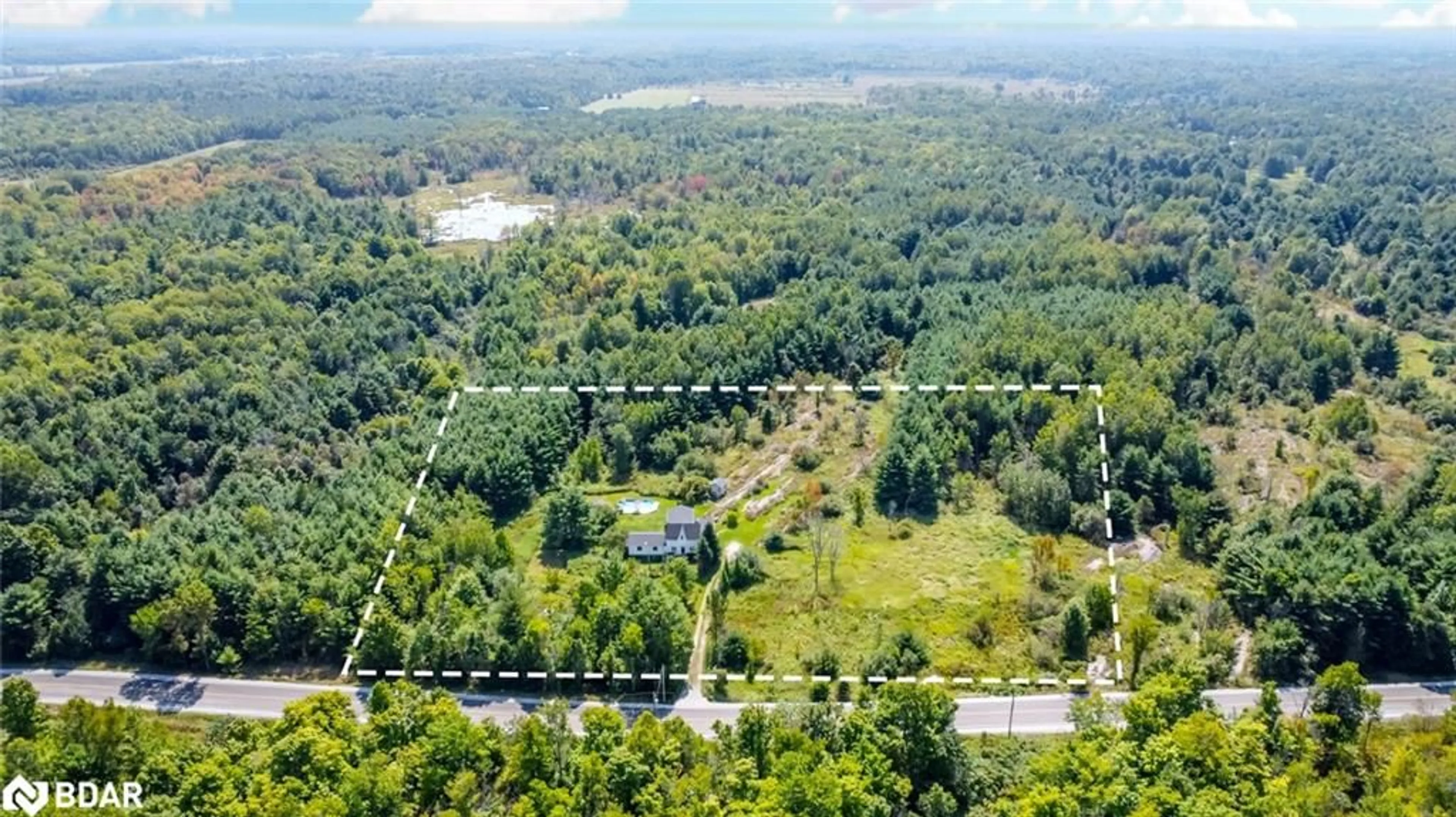 A pic from outside/outdoor area/front of a property/back of a property/a pic from drone, forest/trees view for 2161 Coopers Falls Rd, Washago Ontario L0K 2B0
