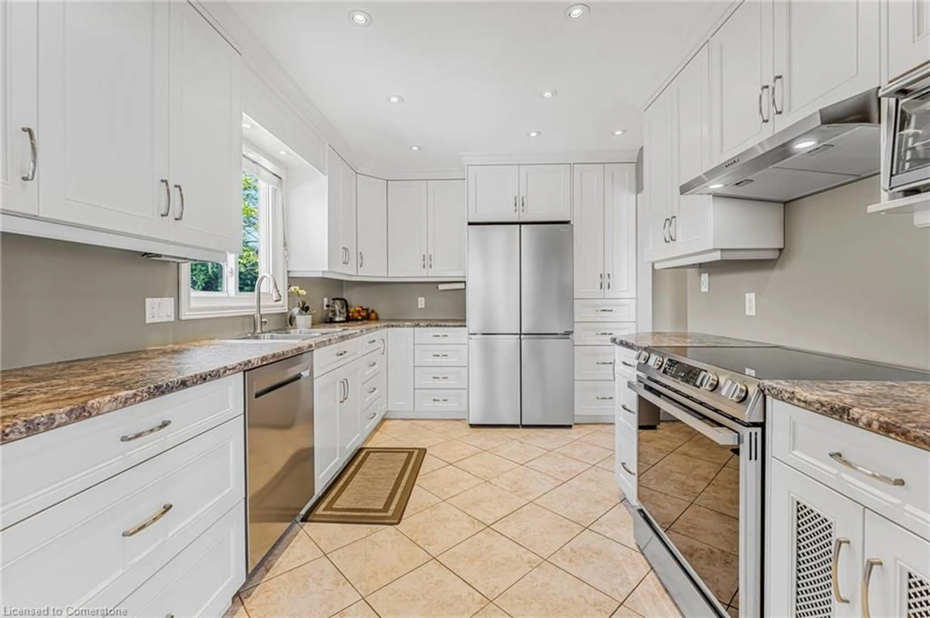 Open concept kitchen, ceramic/tile floor for 3954 Old Orchard Way, Vineland Ontario L0R 2C0