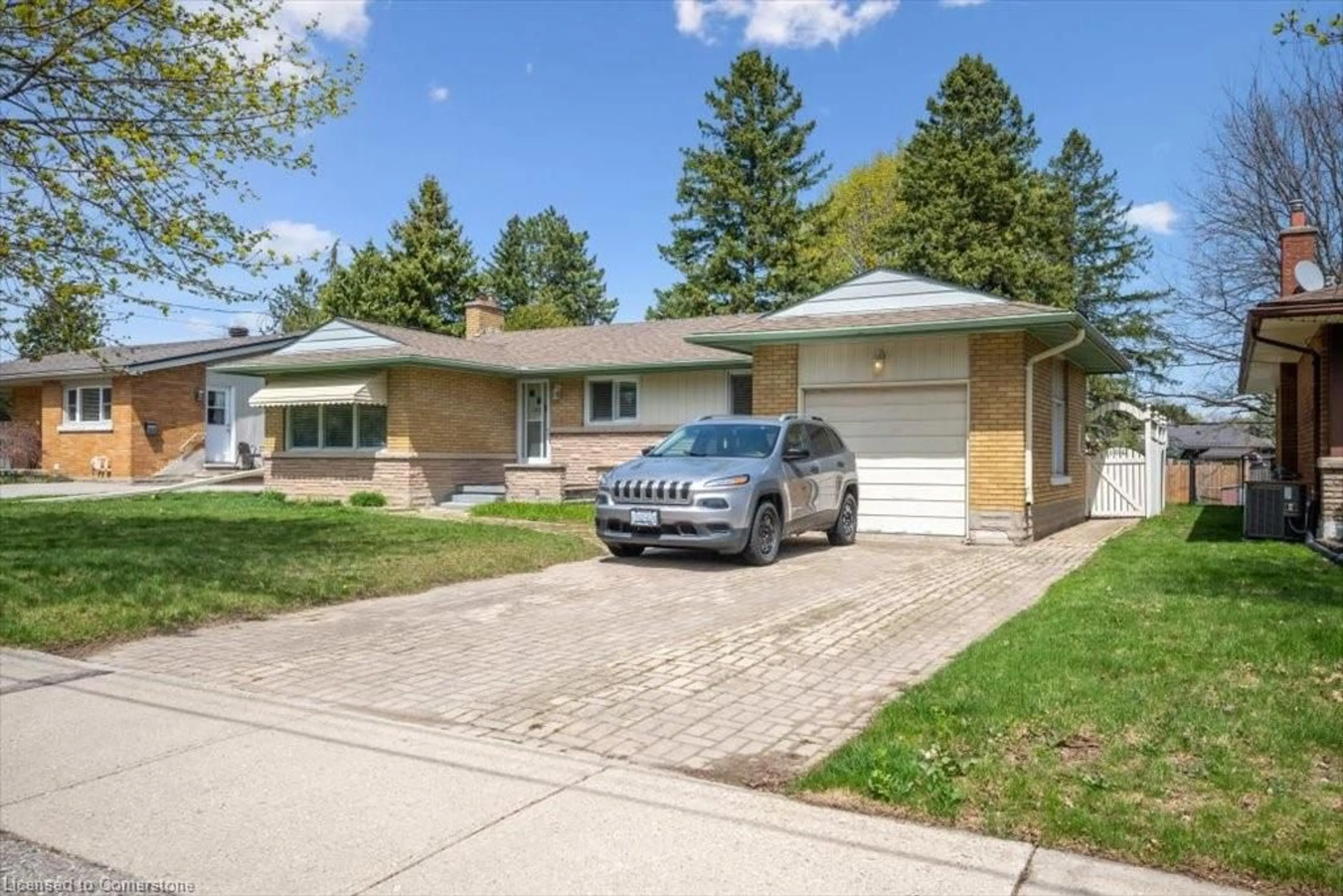 Home with brick exterior material, street for 106 Eton Dr, Kitchener Ontario N2B 1P1