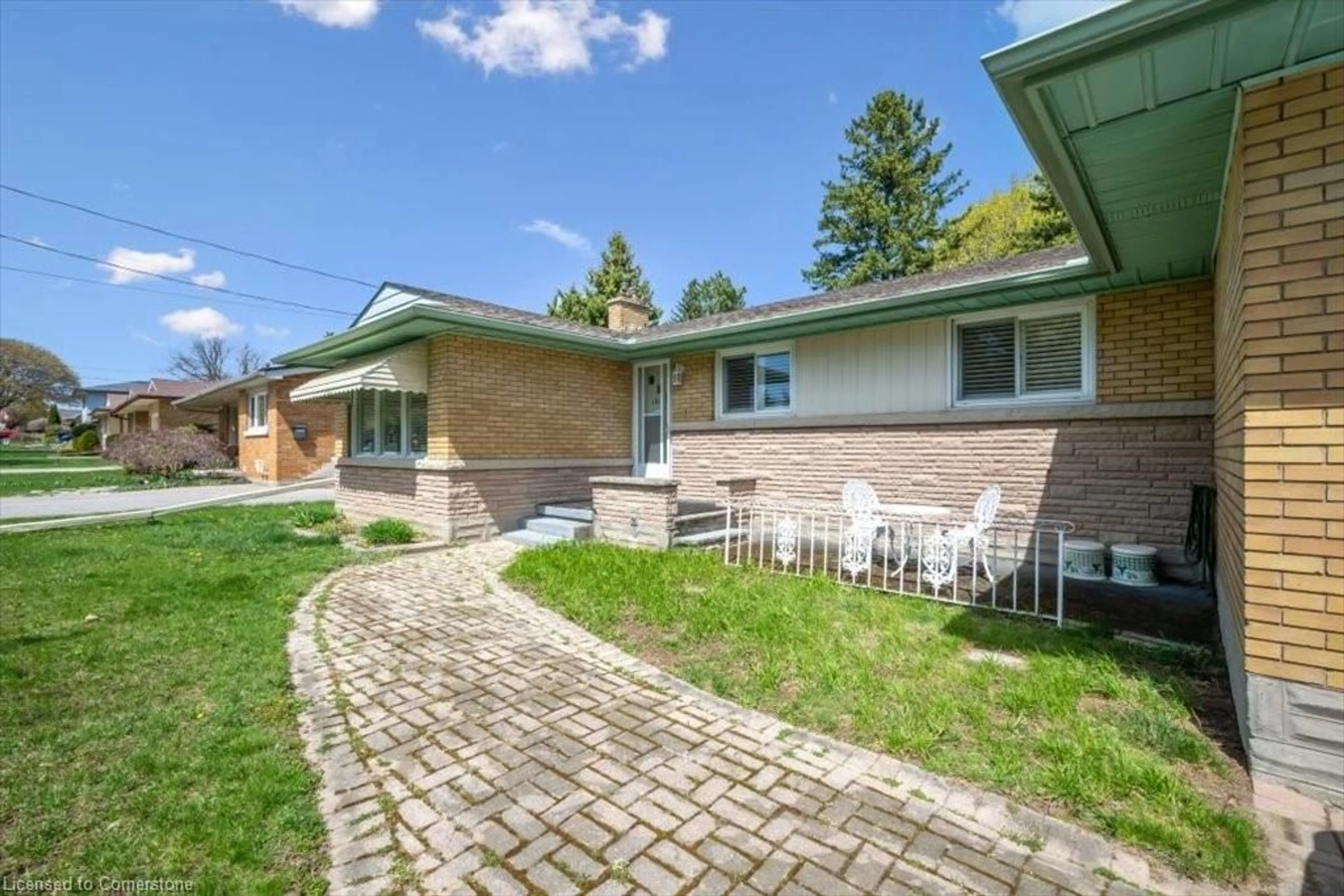 Home with brick exterior material, street for 106 Eton Dr, Kitchener Ontario N2B 1P1