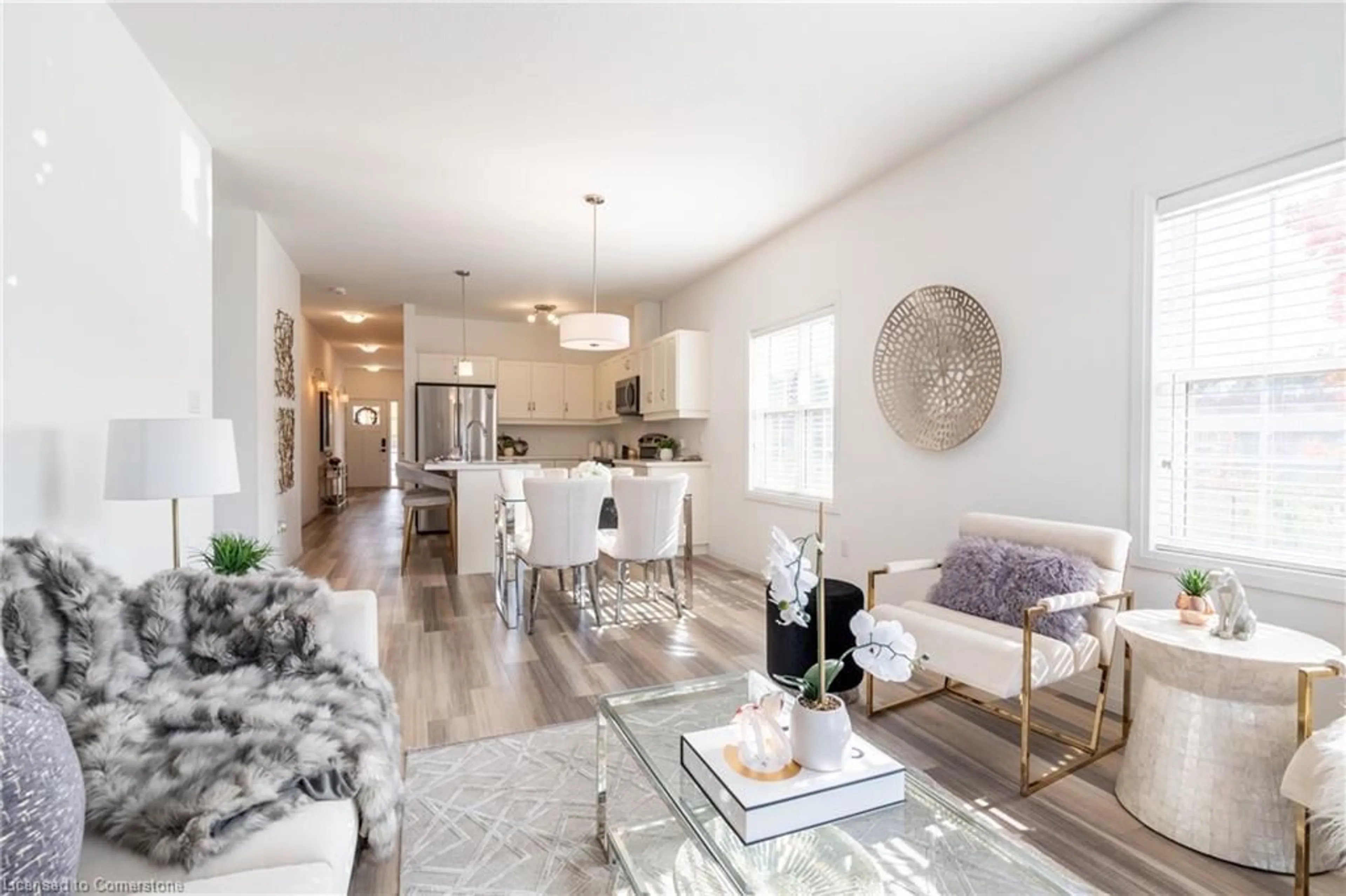 Living room with furniture, wood/laminate floor for 22 South Coast Cir, Crystal Beach Ontario L0S 1B0