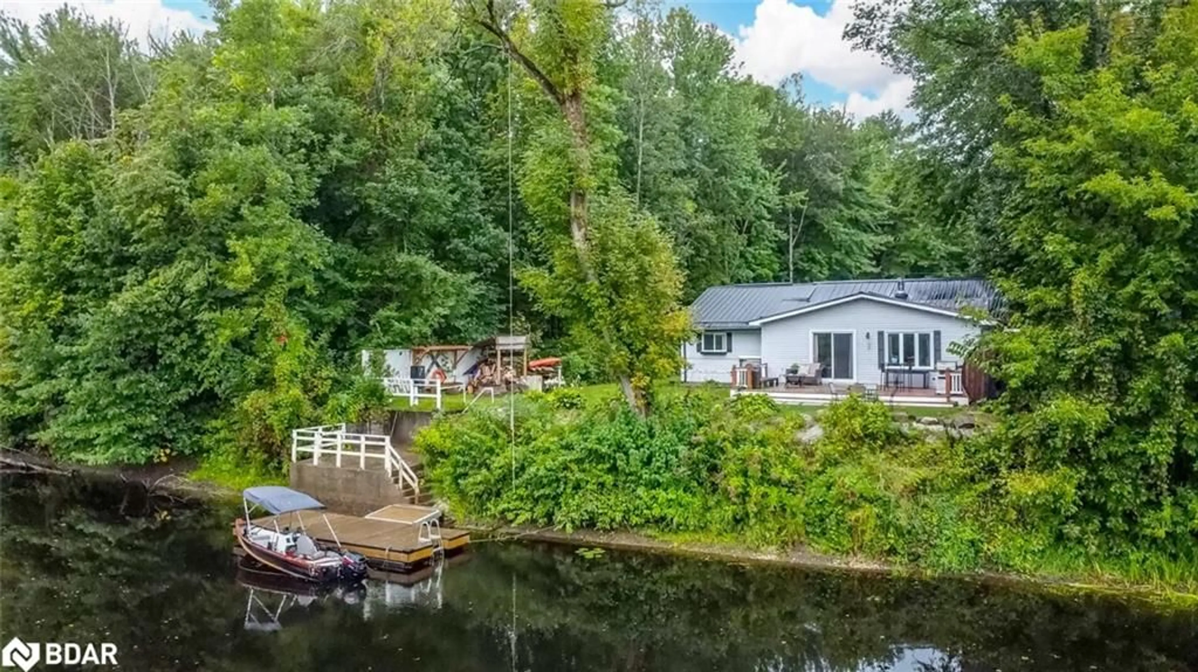 A pic from outside/outdoor area/front of a property/back of a property/a pic from drone, water/lake/river/ocean view for 7229 Davy Dr, Ramara Ontario L0K 2B0