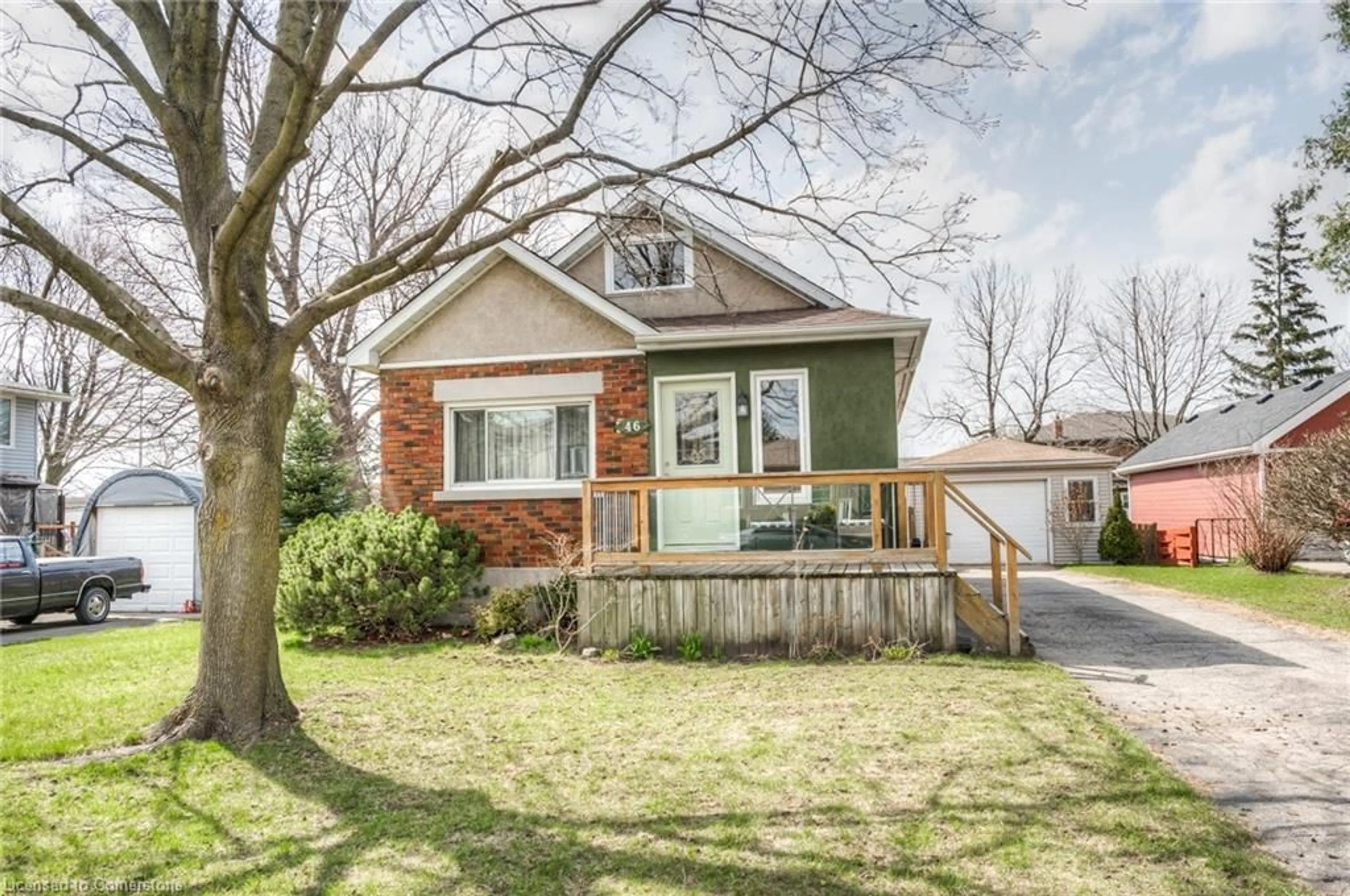 Home with brick exterior material, street for 46 2 Ave, Kitchener Ontario N2C 1N5