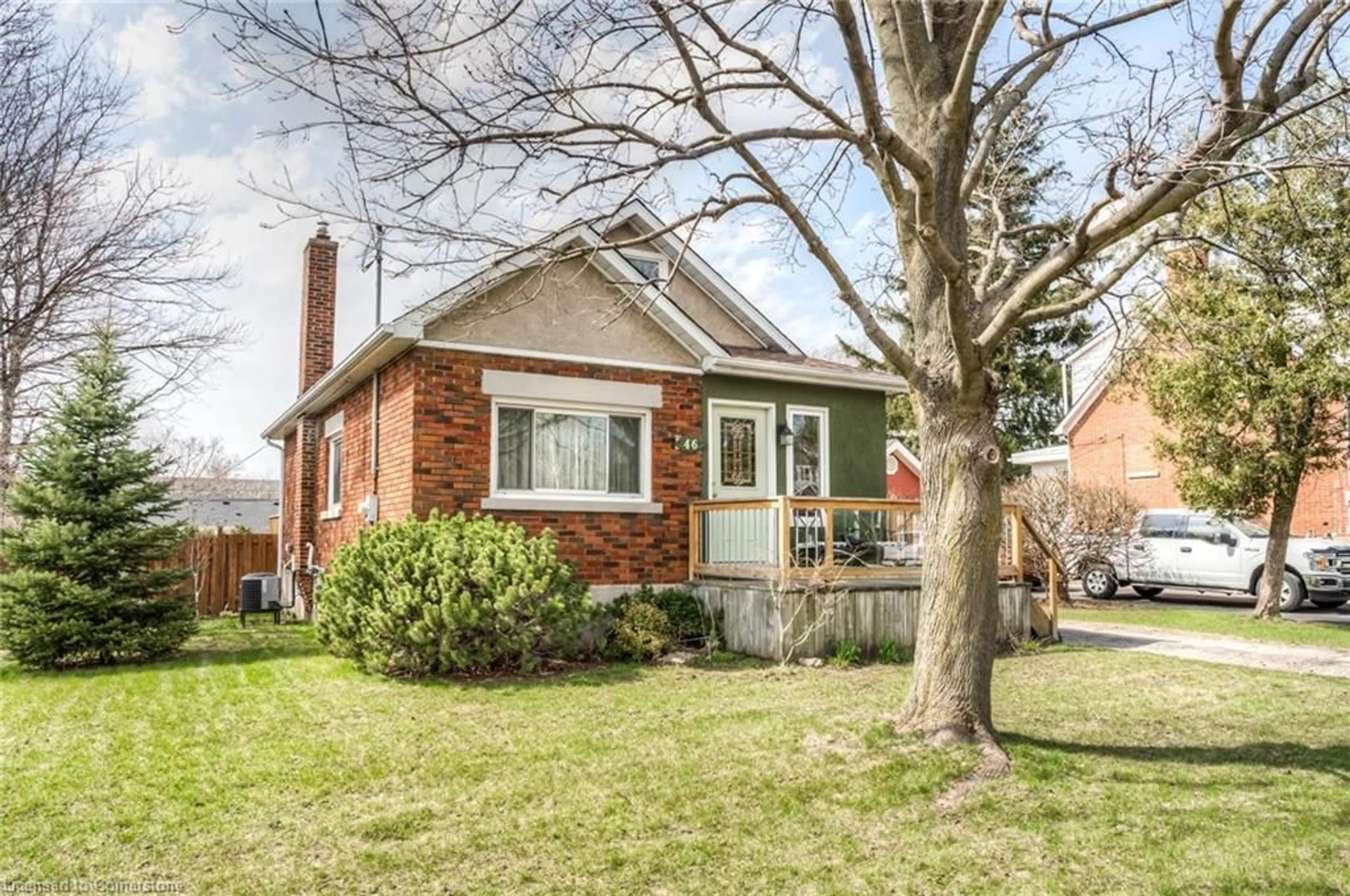 Home with brick exterior material, street for 46 2 Ave, Kitchener Ontario N2C 1N5