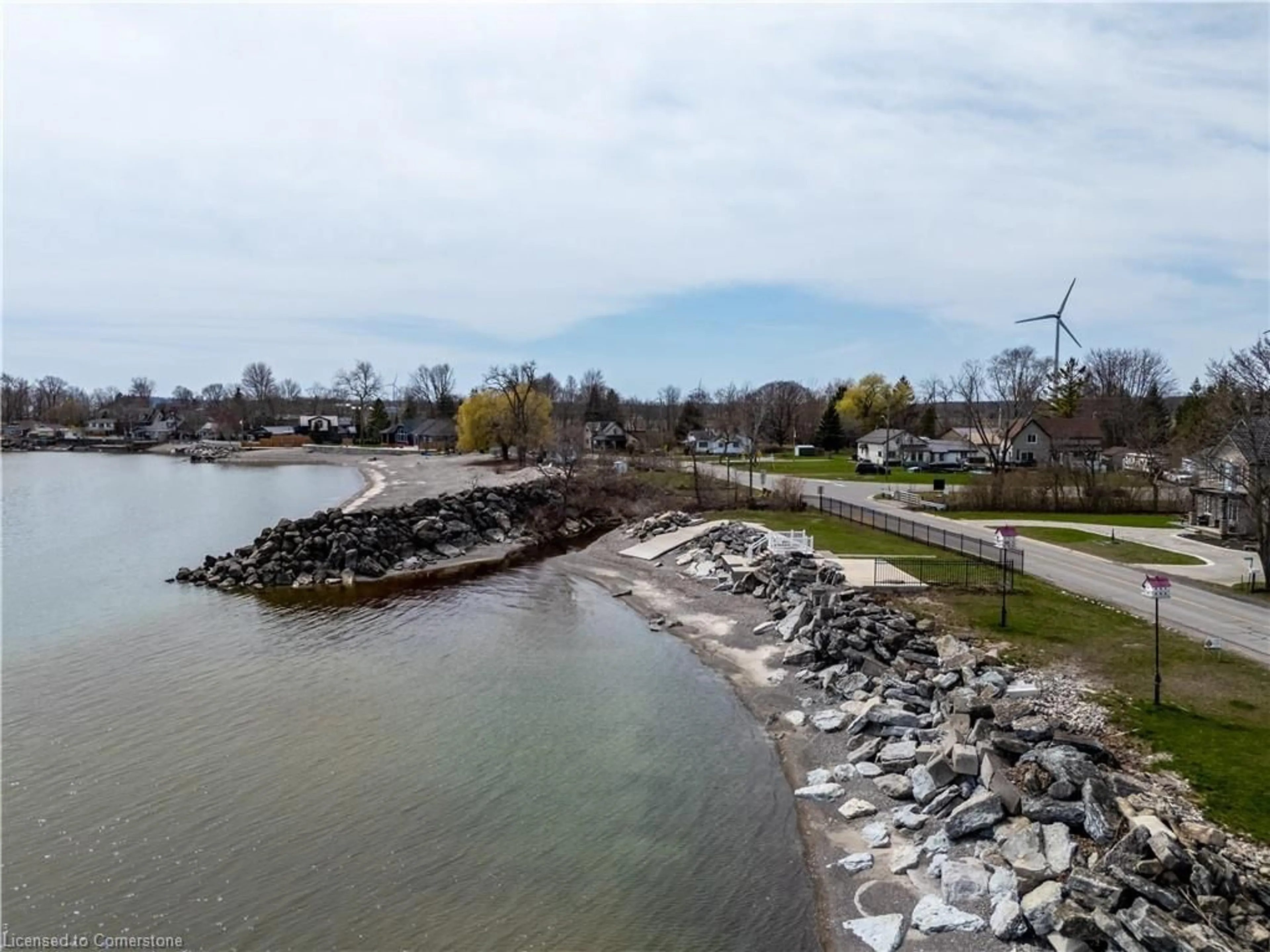 A pic from outside/outdoor area/front of a property/back of a property/a pic from drone, water/lake/river/ocean view for 2801 North Shore Dr, Lowbanks Ontario N0A 1K0