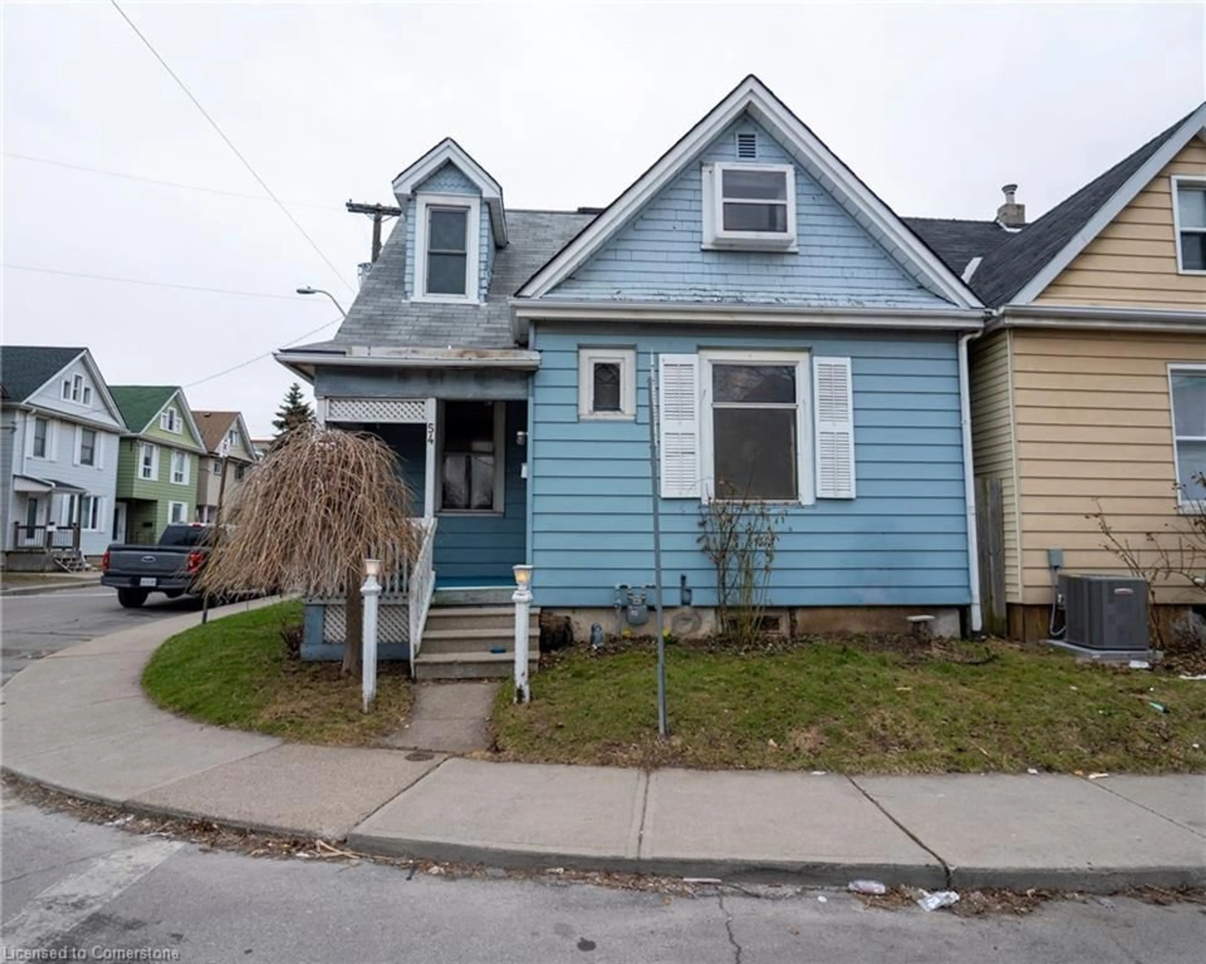 Home with vinyl exterior material, street for 54 Harvey St, Hamilton Ontario L8L 2L8