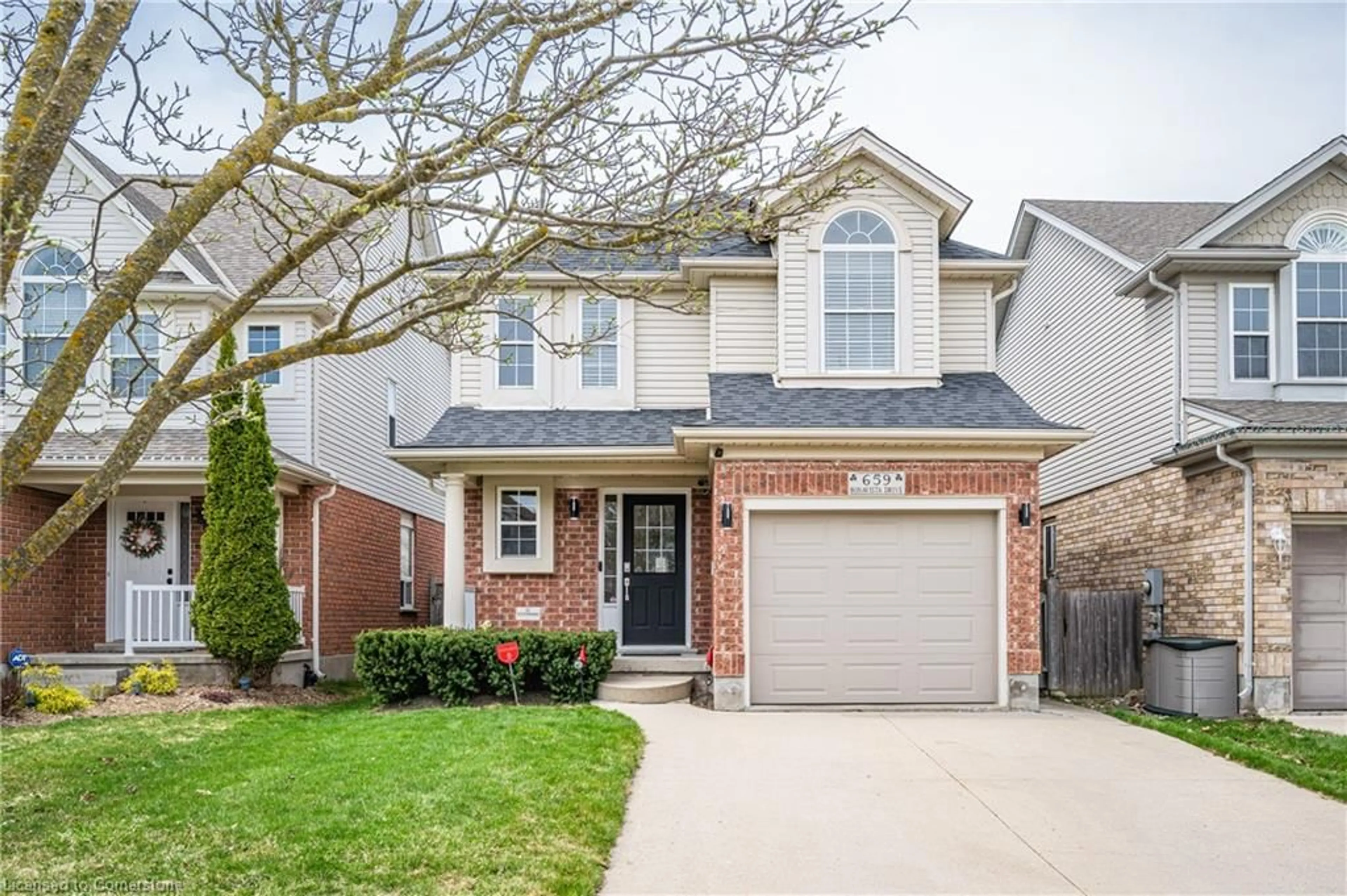Home with brick exterior material, street for 659 Bonavista Dr, Waterloo Ontario N2K 4E9