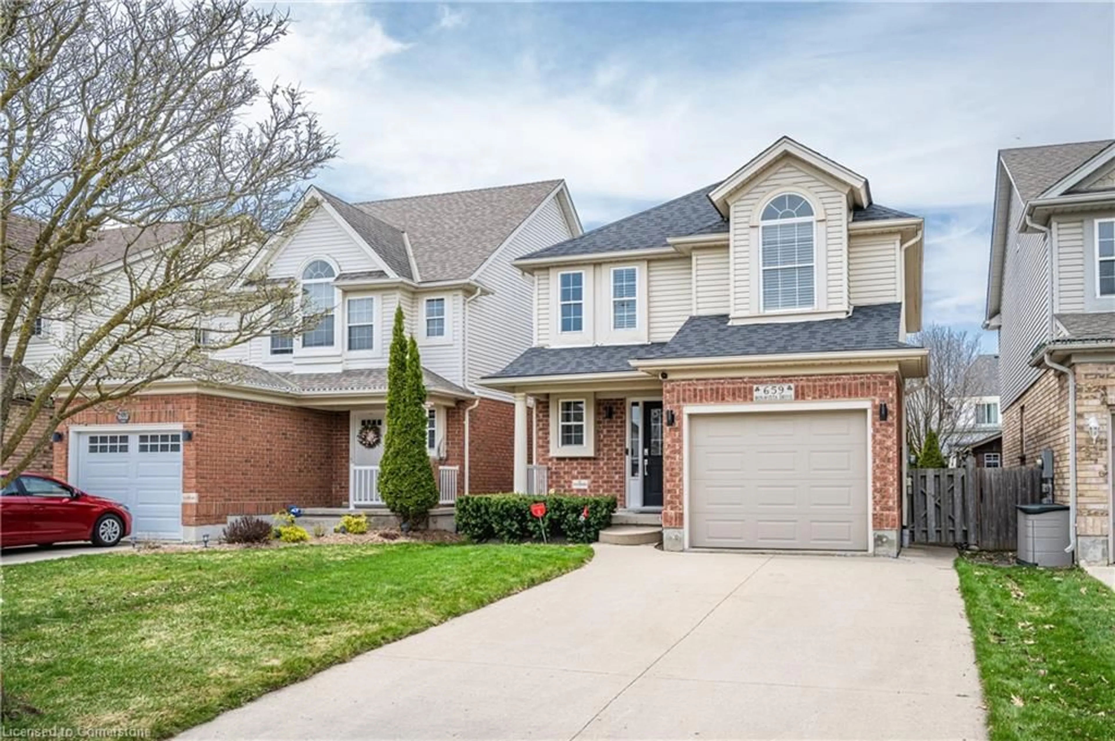 Home with brick exterior material, street for 659 Bonavista Dr, Waterloo Ontario N2K 4E9