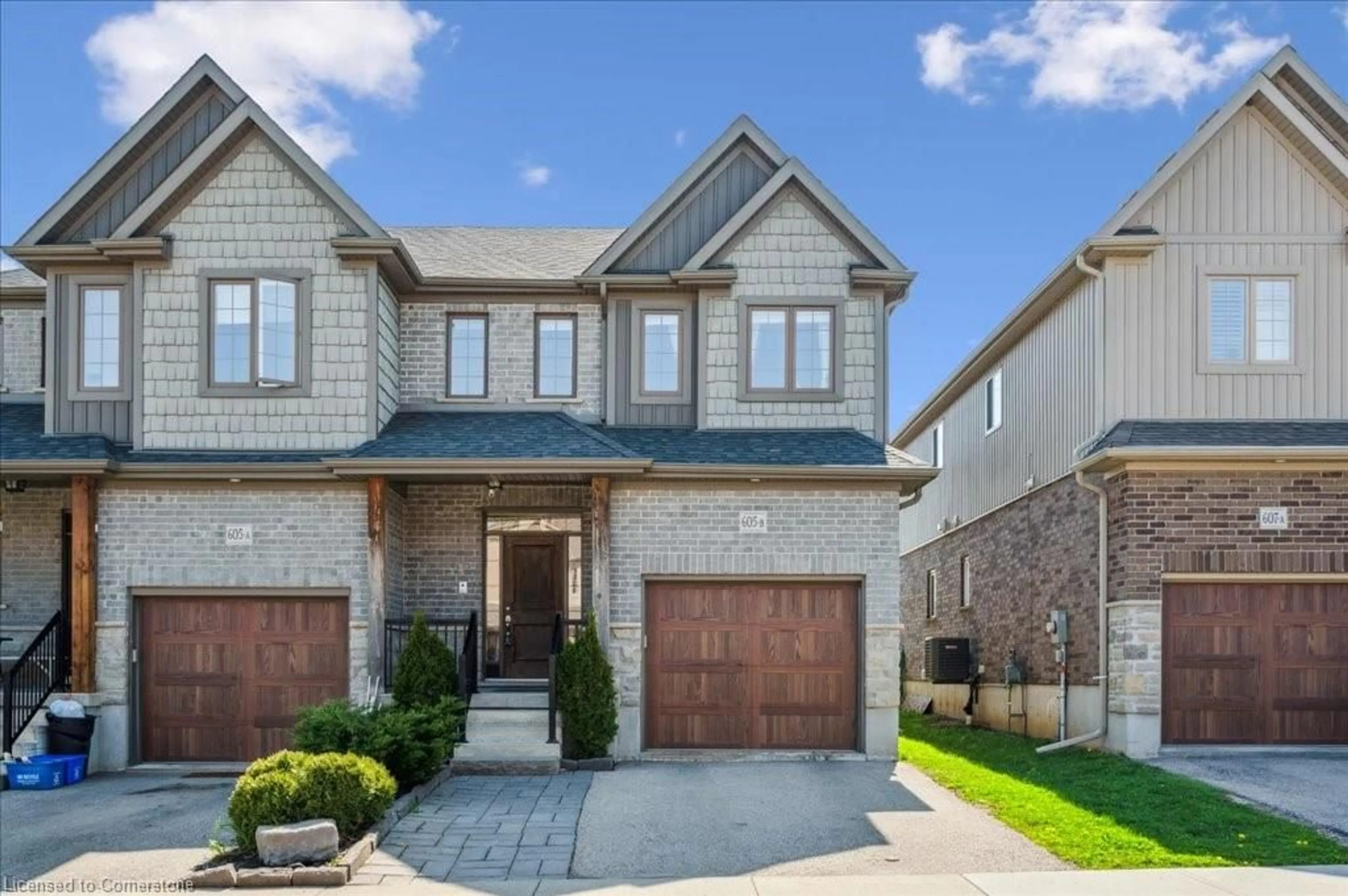 Home with brick exterior material, street for 605 Montpellier Dr #B, Waterloo Ontario N2T 2Z4