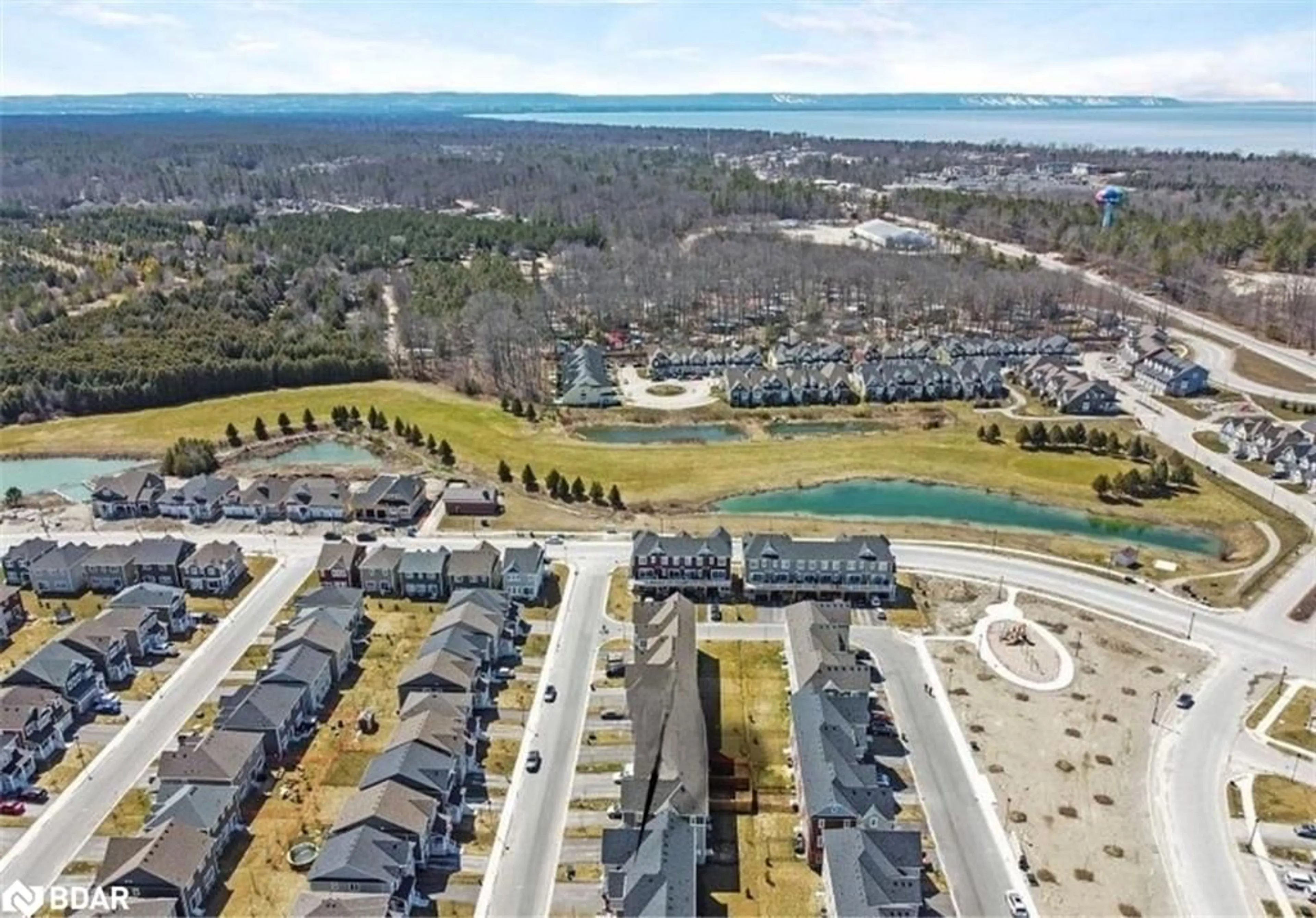 A pic from outside/outdoor area/front of a property/back of a property/a pic from drone, water/lake/river/ocean view for 48 High Tide Drive, Wasaga Beach Ontario L9Z 2X2