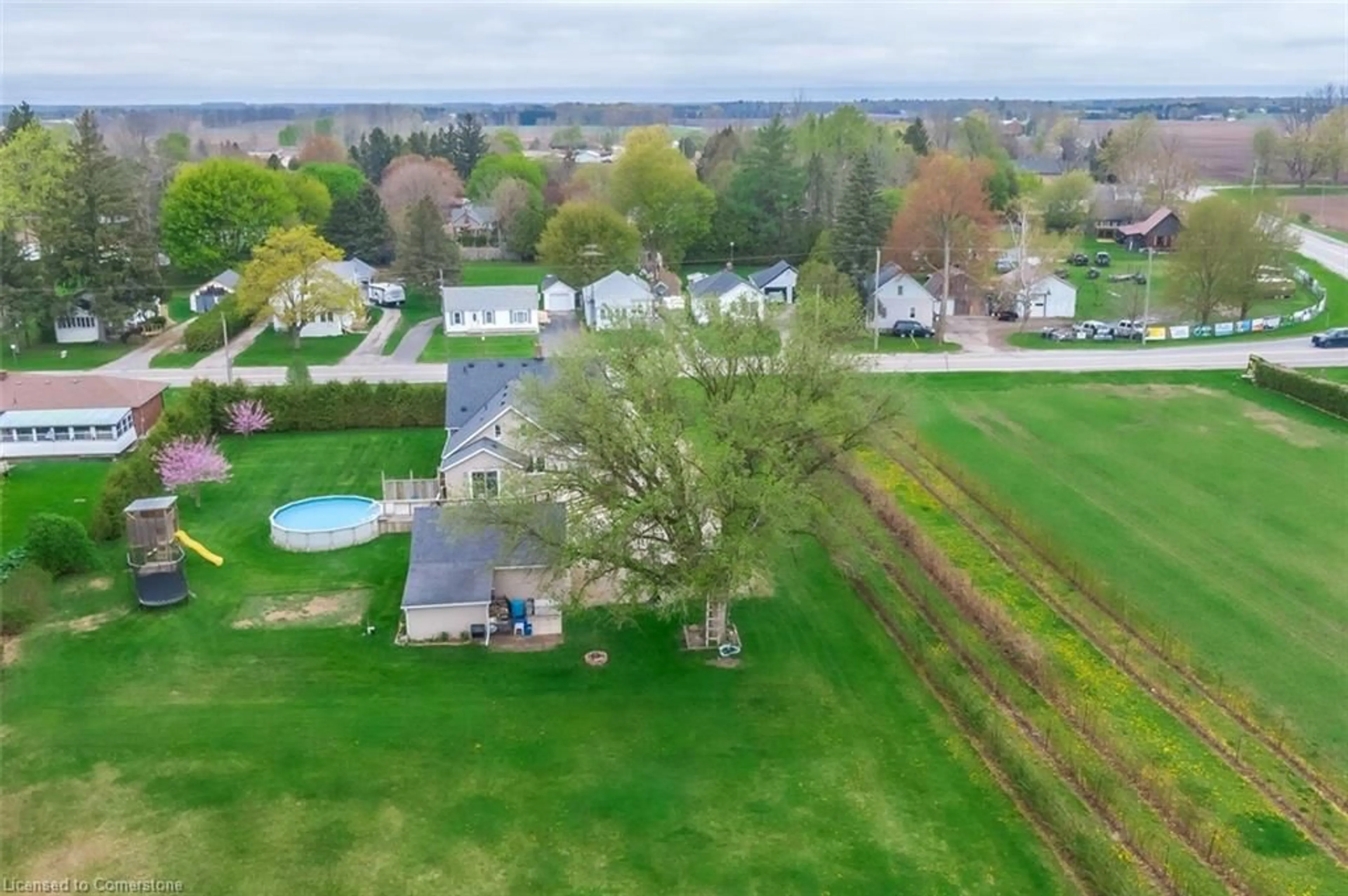 A pic from outside/outdoor area/front of a property/back of a property/a pic from drone, water/lake/river/ocean view for 472 Church Street East, Delhi Ontario N4B 1V3