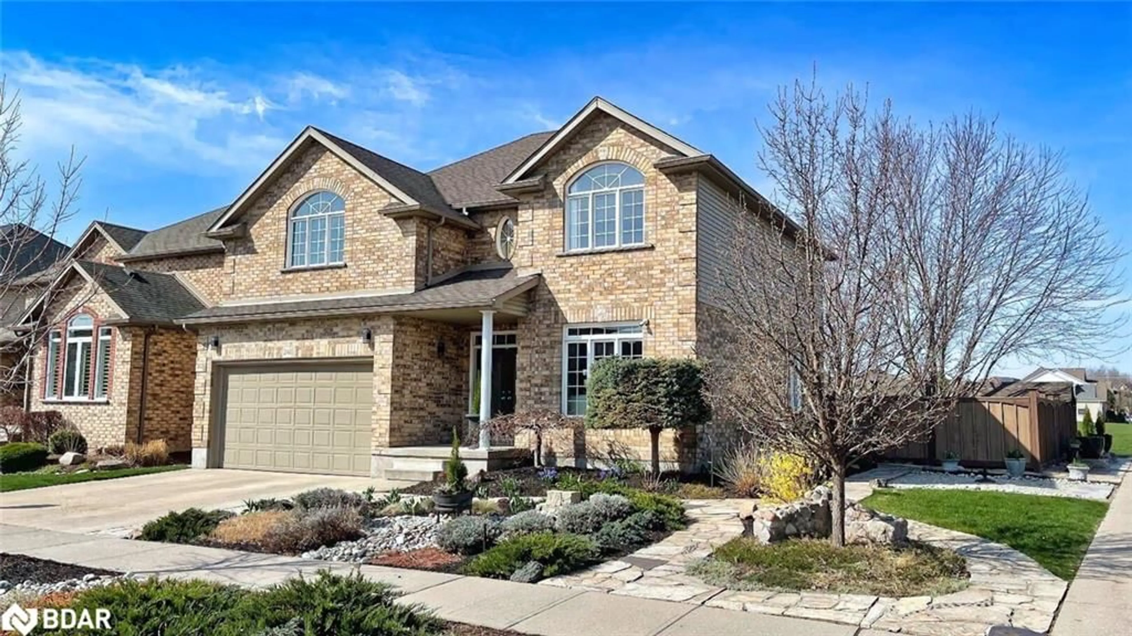 Home with brick exterior material, street for 242 Hawkswood Dr, Kitchener Ontario N2K 4J2