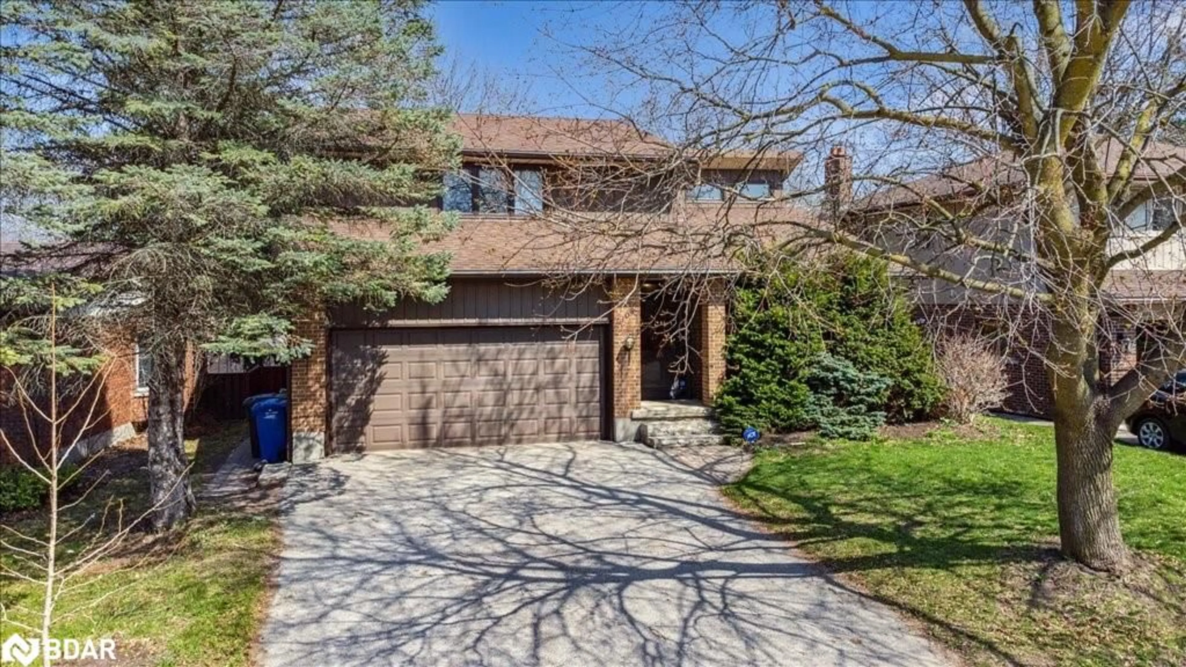 Home with brick exterior material, street for 208 Ironwood Rd, Guelph Ontario N1G 3K3