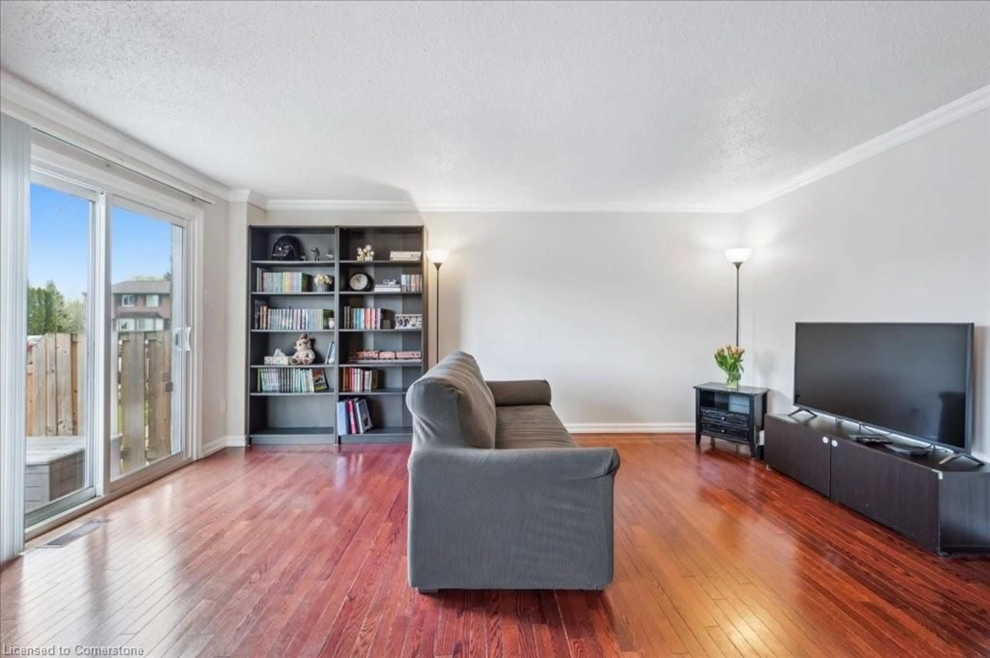 Living room with furniture, wood/laminate floor for 700 Erinbrook Dr #16, Kitchener Ontario N2E 2S7