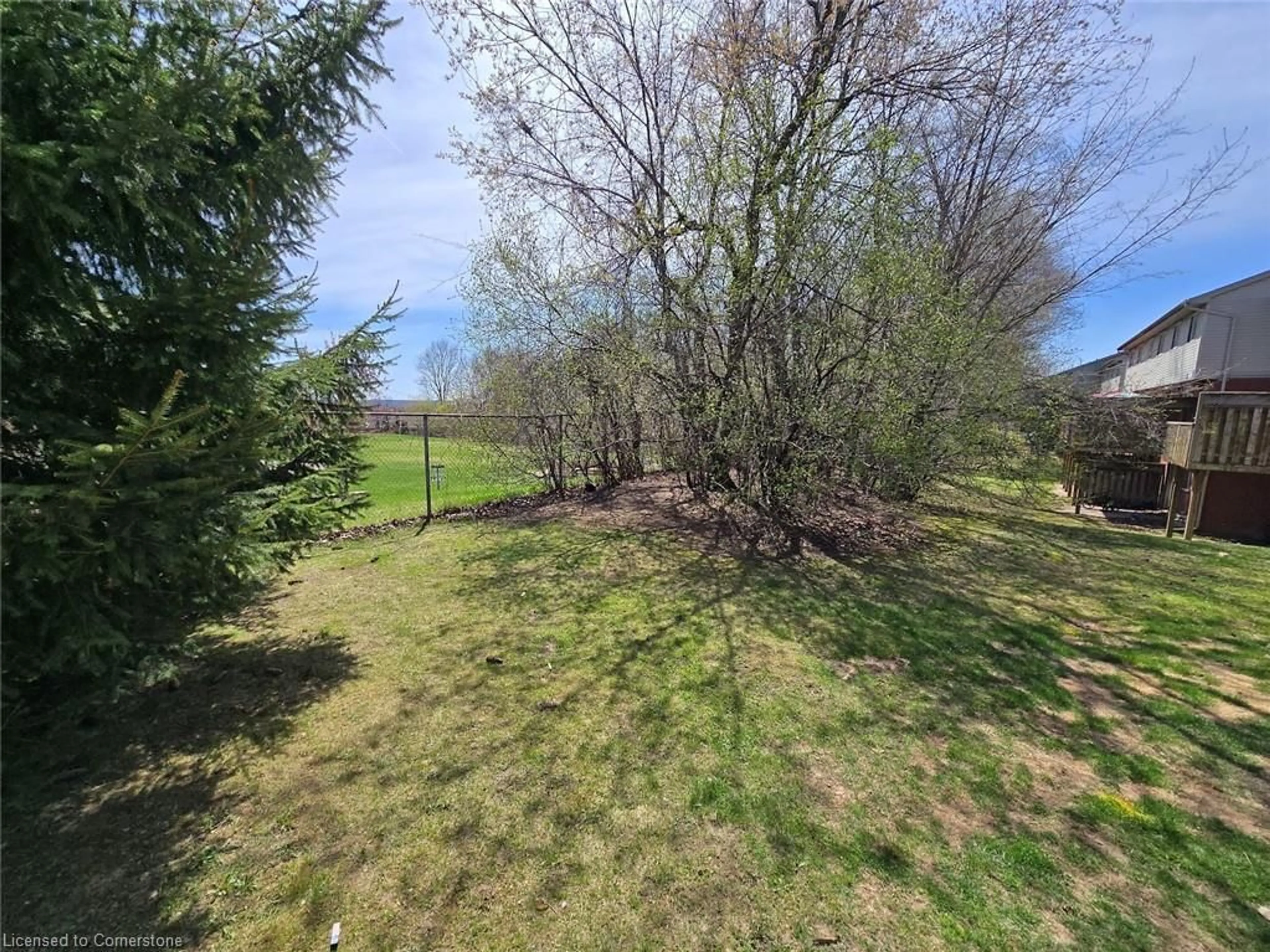 A pic from outside/outdoor area/front of a property/back of a property/a pic from drone, forest/trees view for 235 Saginaw Pky #73, Cambridge Ontario N1T 1X4