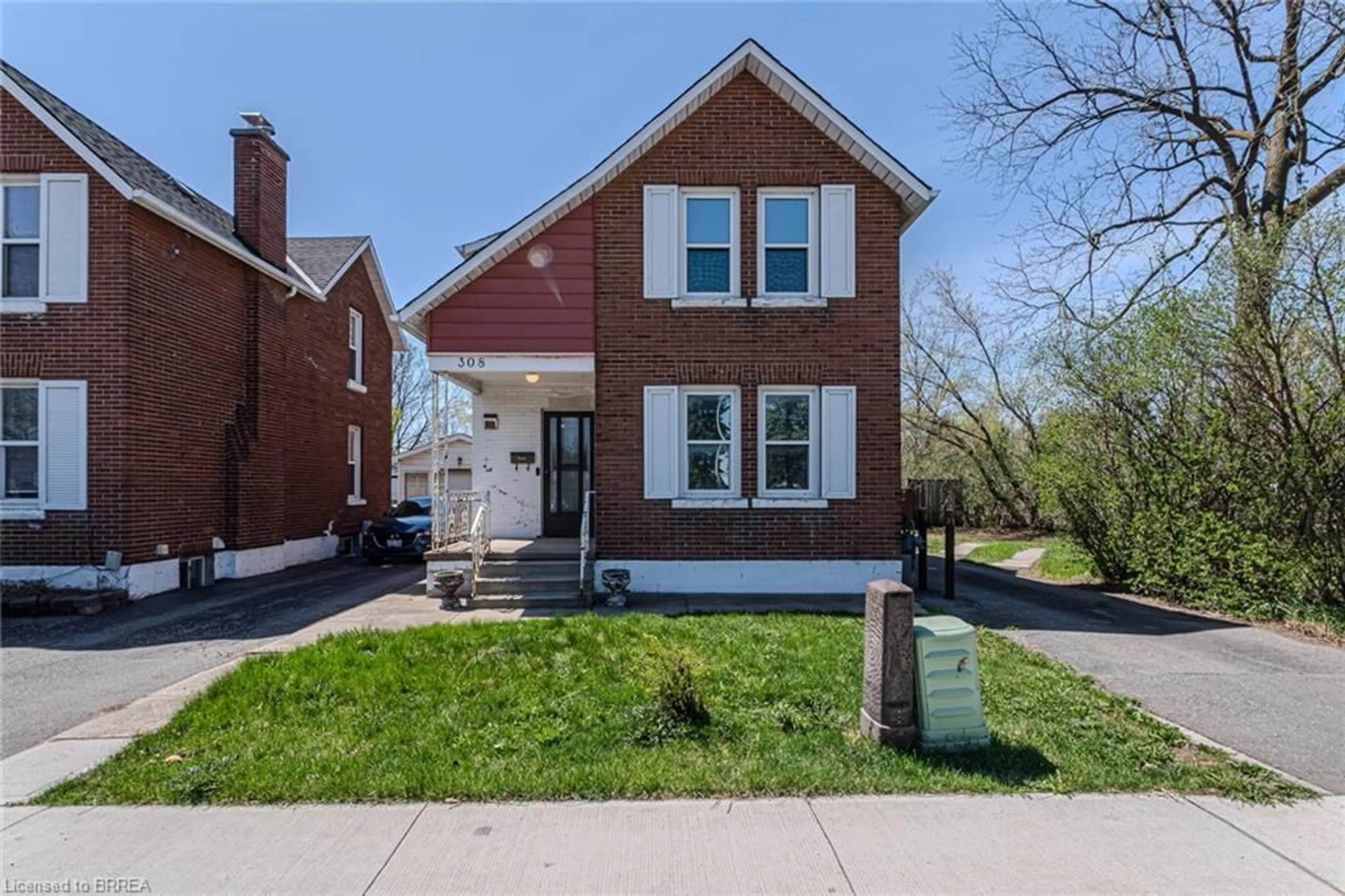 Home with brick exterior material, street for 308 Dundas St, Cambridge Ontario N1R 5P7