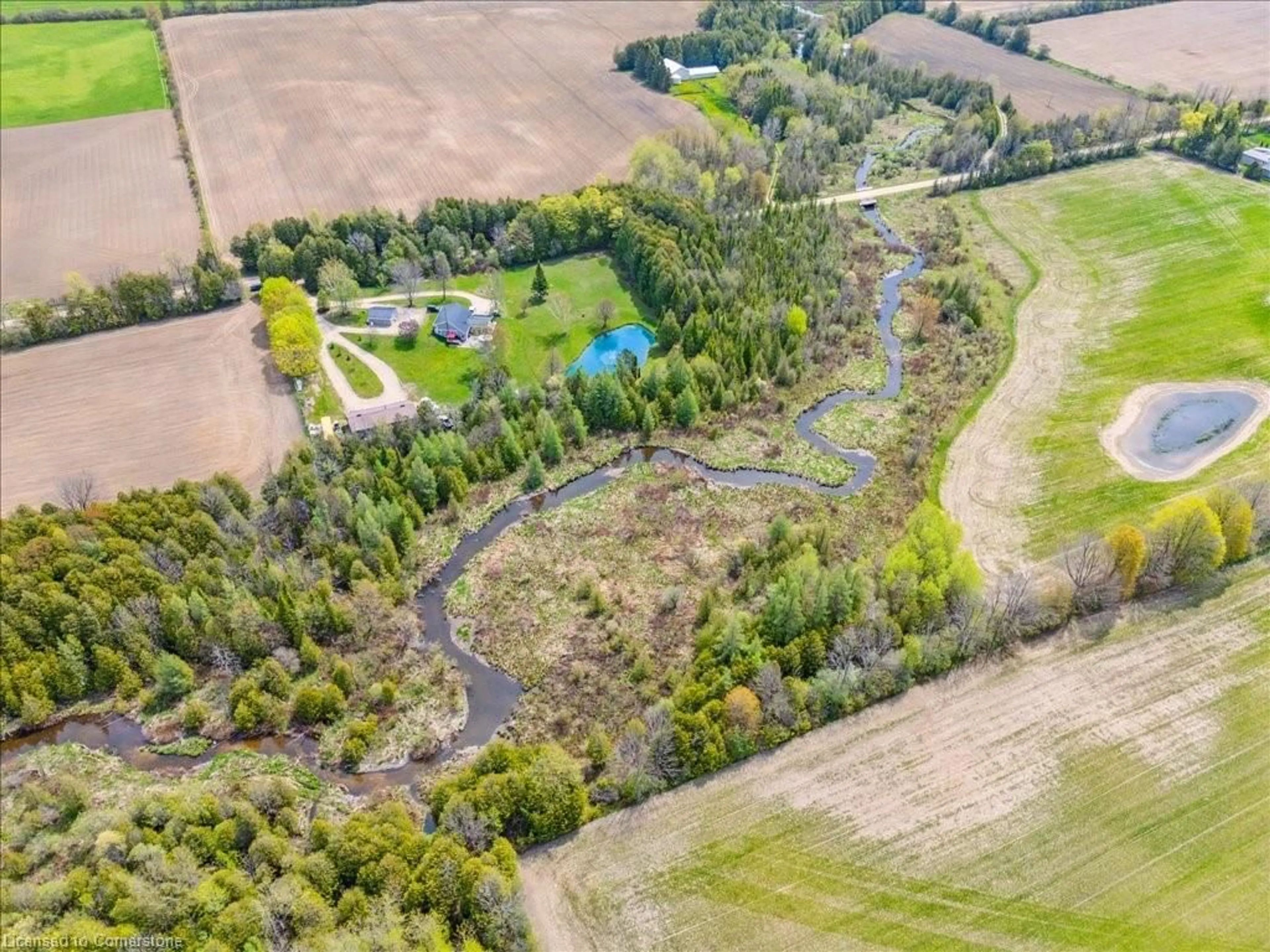 A pic from outside/outdoor area/front of a property/back of a property/a pic from drone, forest/trees view for 471568 Southgate Sdrd 47, Mount Forest Ontario N0G 2L0