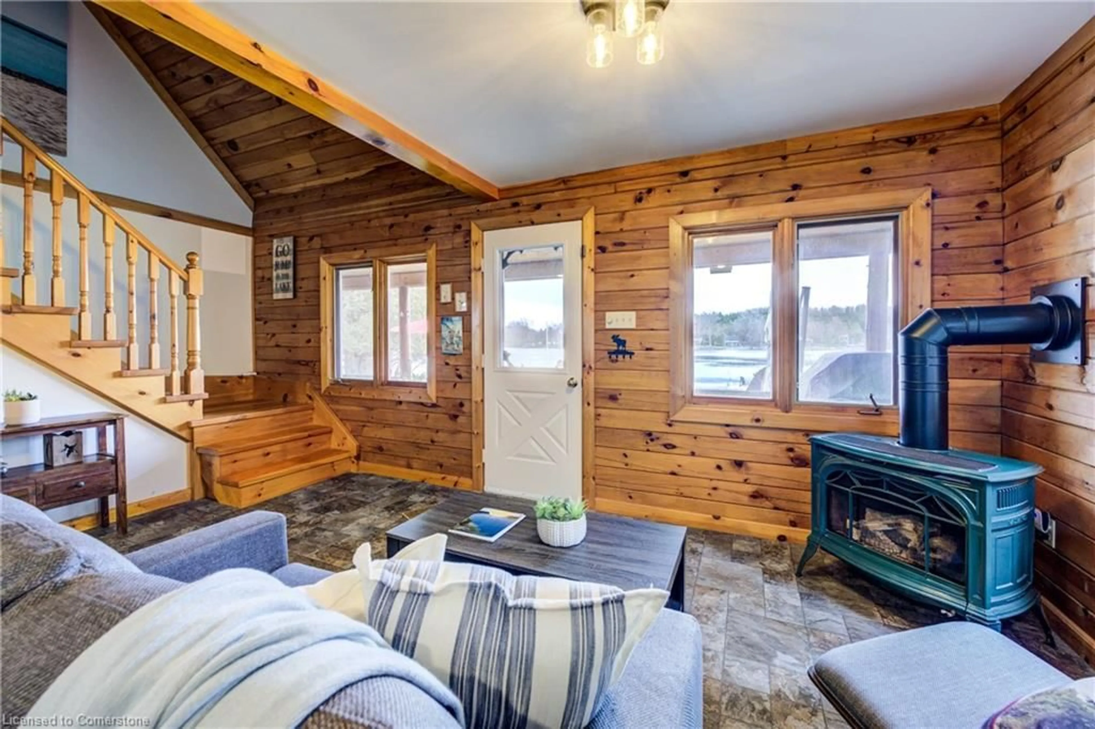 Living room with furniture, wood/laminate floor for 462 Road 4, Conestogo Lake Ontario N0G 1P0