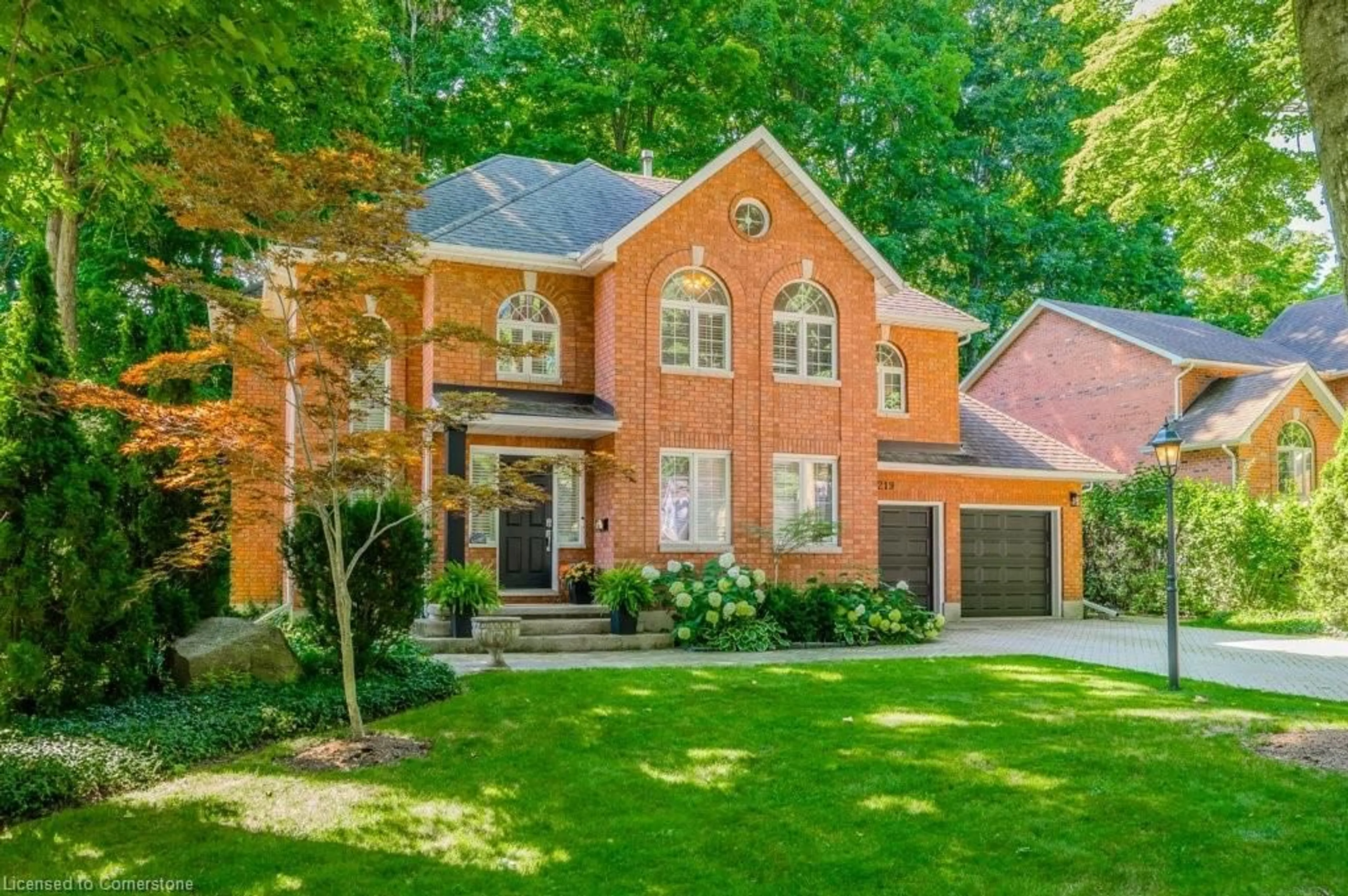 Home with brick exterior material, street for 219 Corrie Cres, Waterloo Ontario N2L 5W3