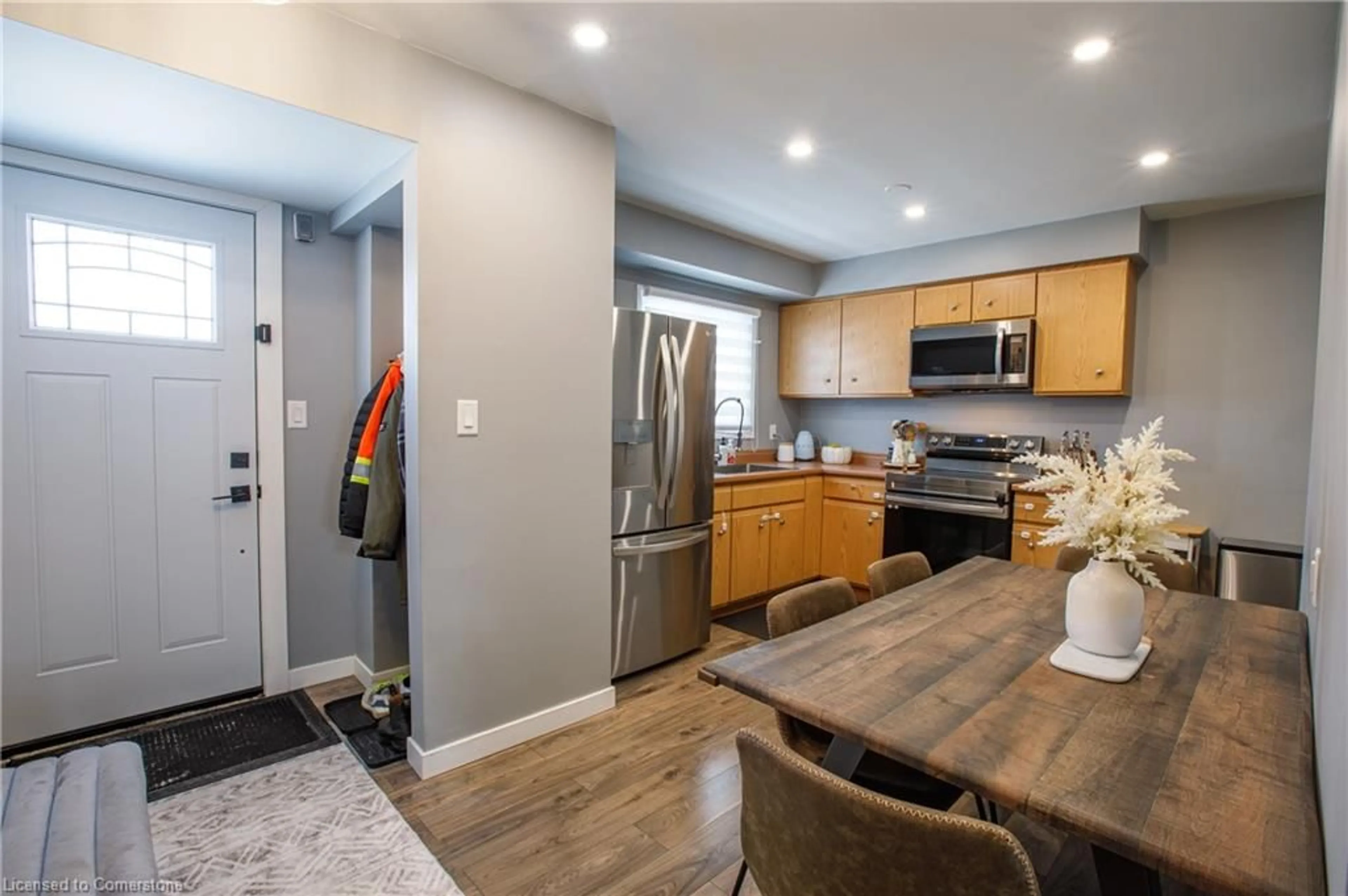Open concept kitchen, wood/laminate floor for 2739 Meadowbrook Lane, Windsor Ontario N8T 2Y6