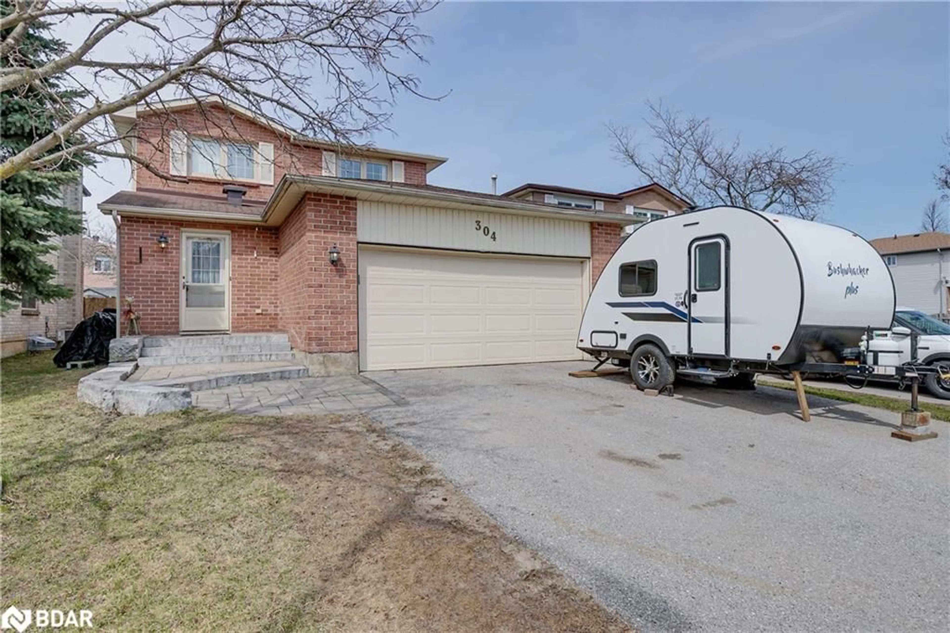 Home with brick exterior material, street for 304 Hickling Trail, Barrie Ontario L4M 5X9