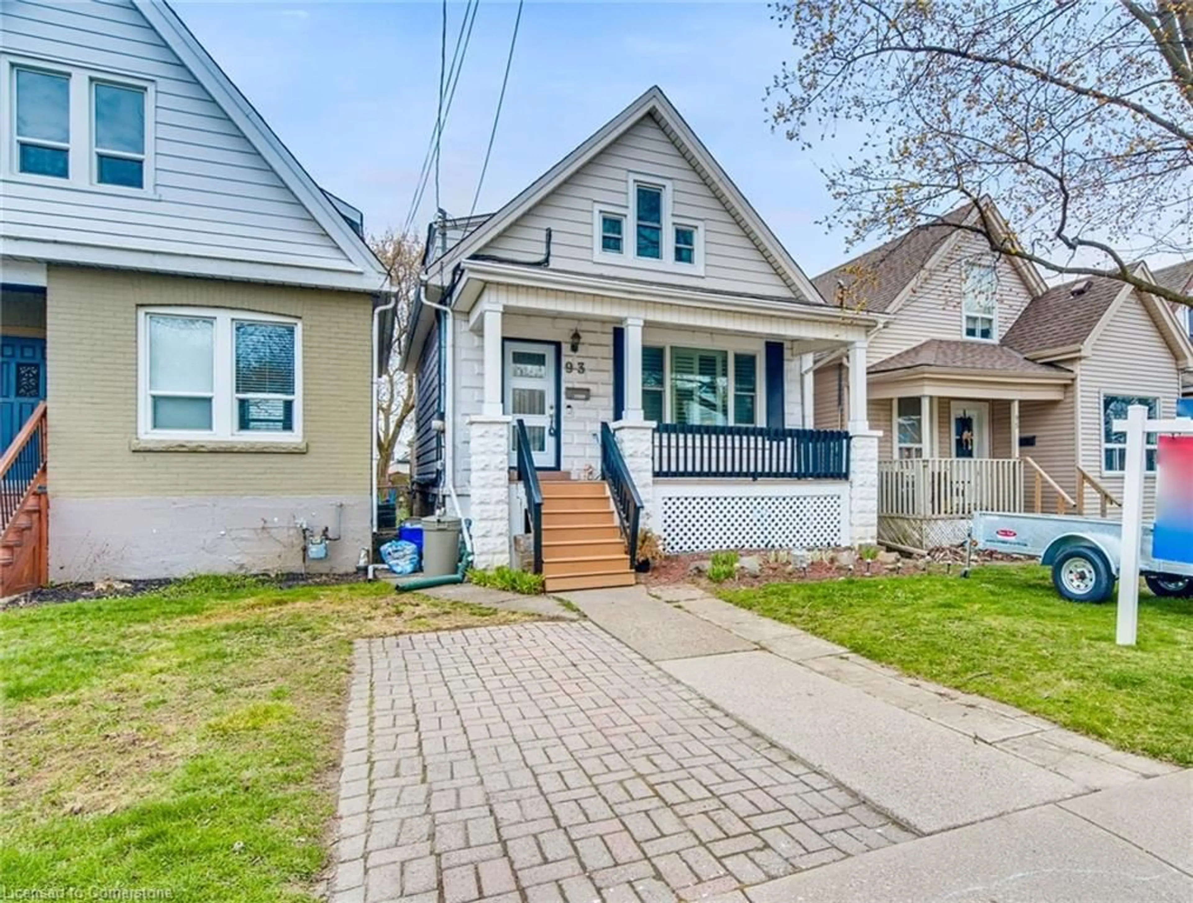 Home with vinyl exterior material, street for 93 East 23rd St, Hamilton Ontario L8V 2W7