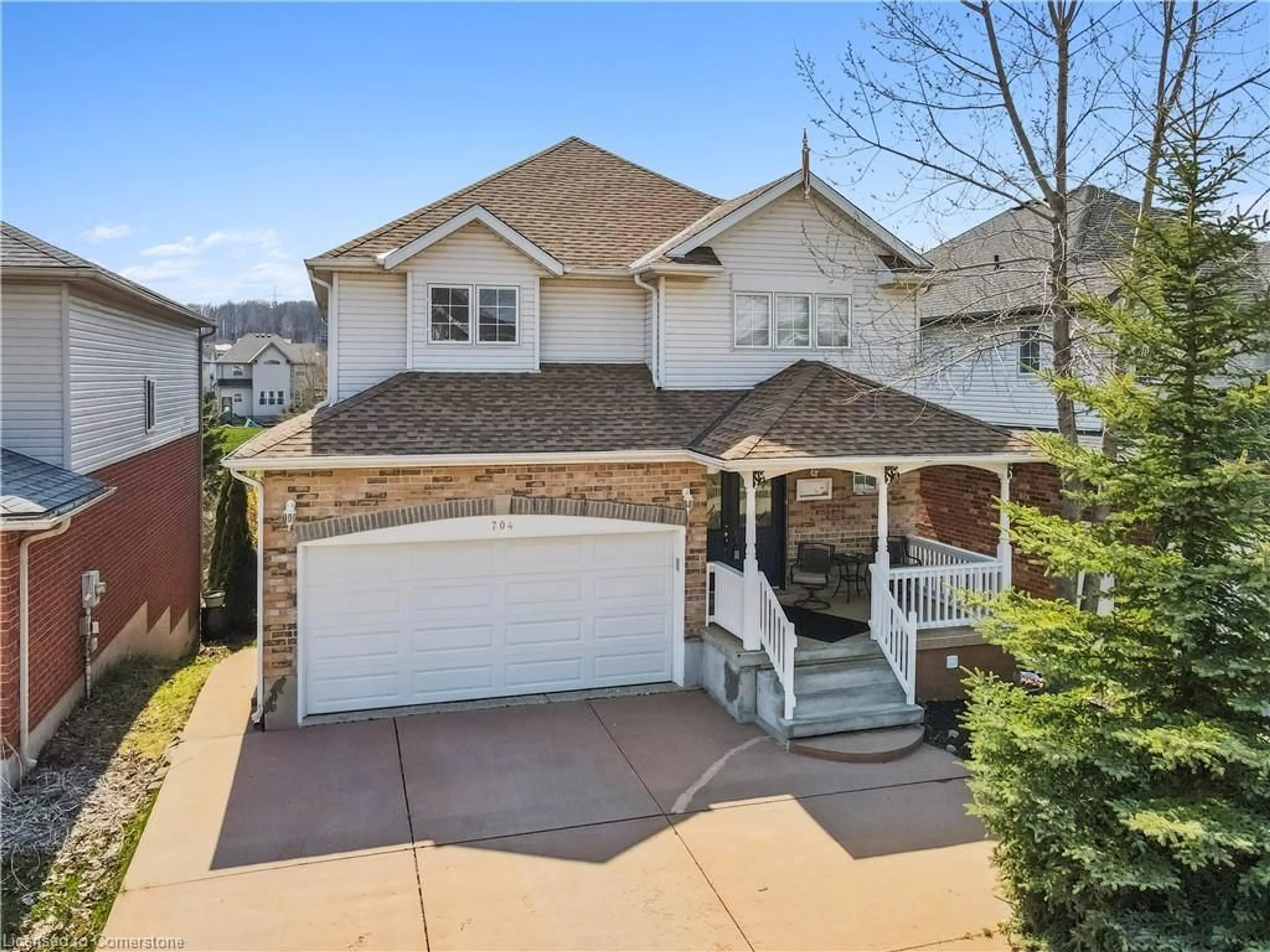 Home with vinyl exterior material, street for 704 Brandenburg Blvd, Waterloo Ontario N2T 2V4