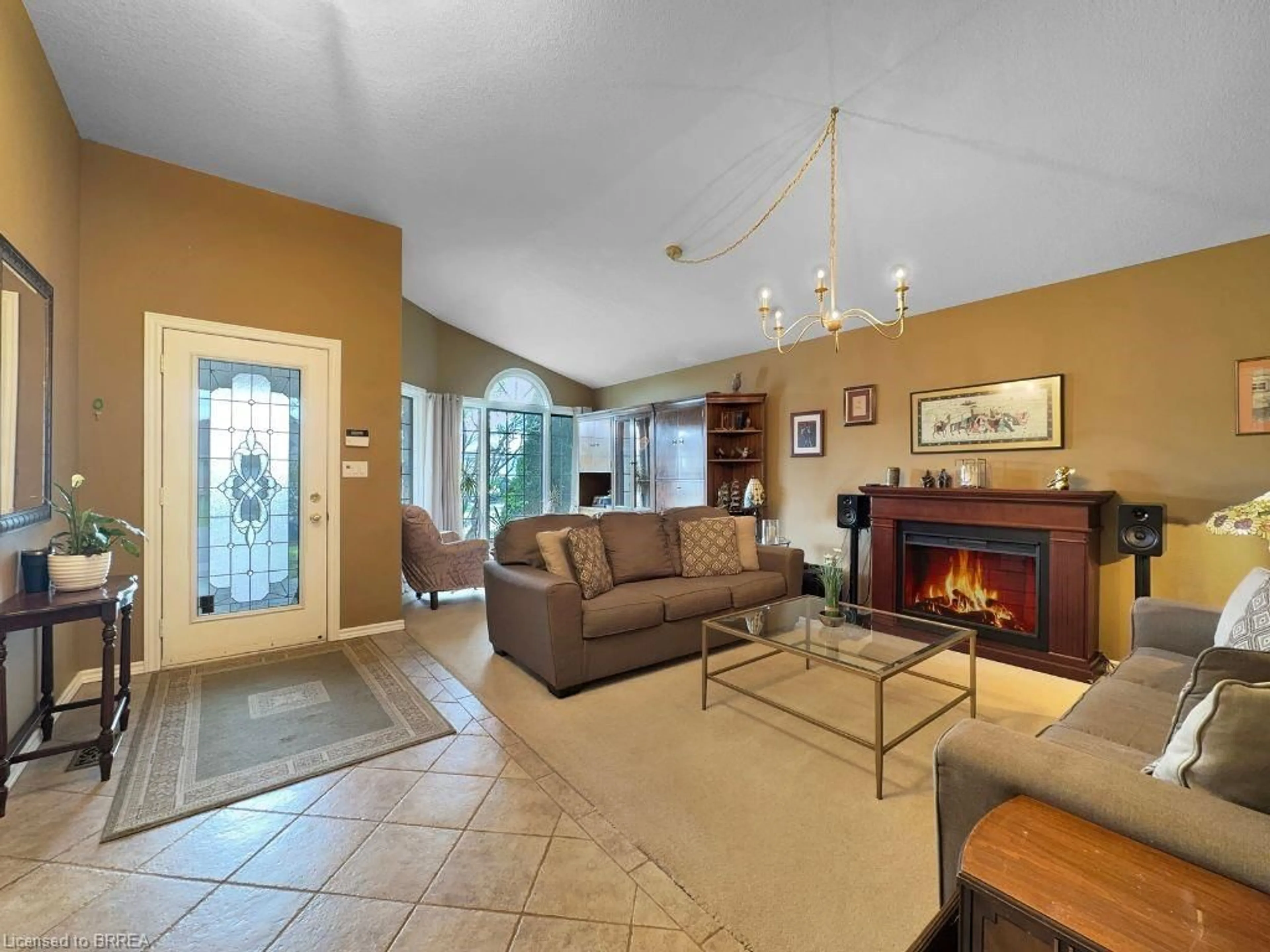 Living room with furniture, ceramic/tile floor for 104 Mcguiness Dr, Brantford Ontario N3T 6R7