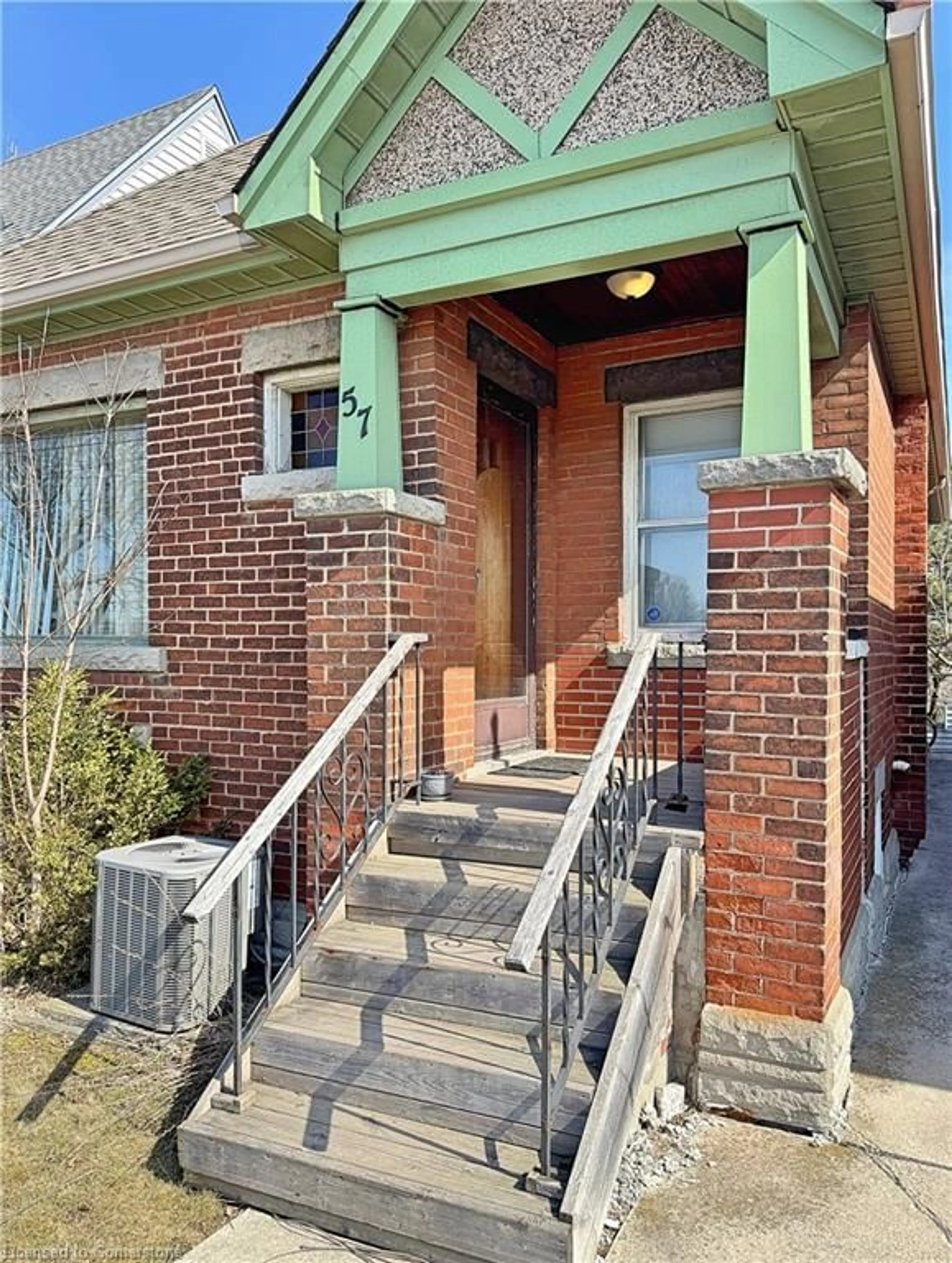 Home with brick exterior material, street for 57 Paradise Rd, Hamilton Ontario L8S 1S3