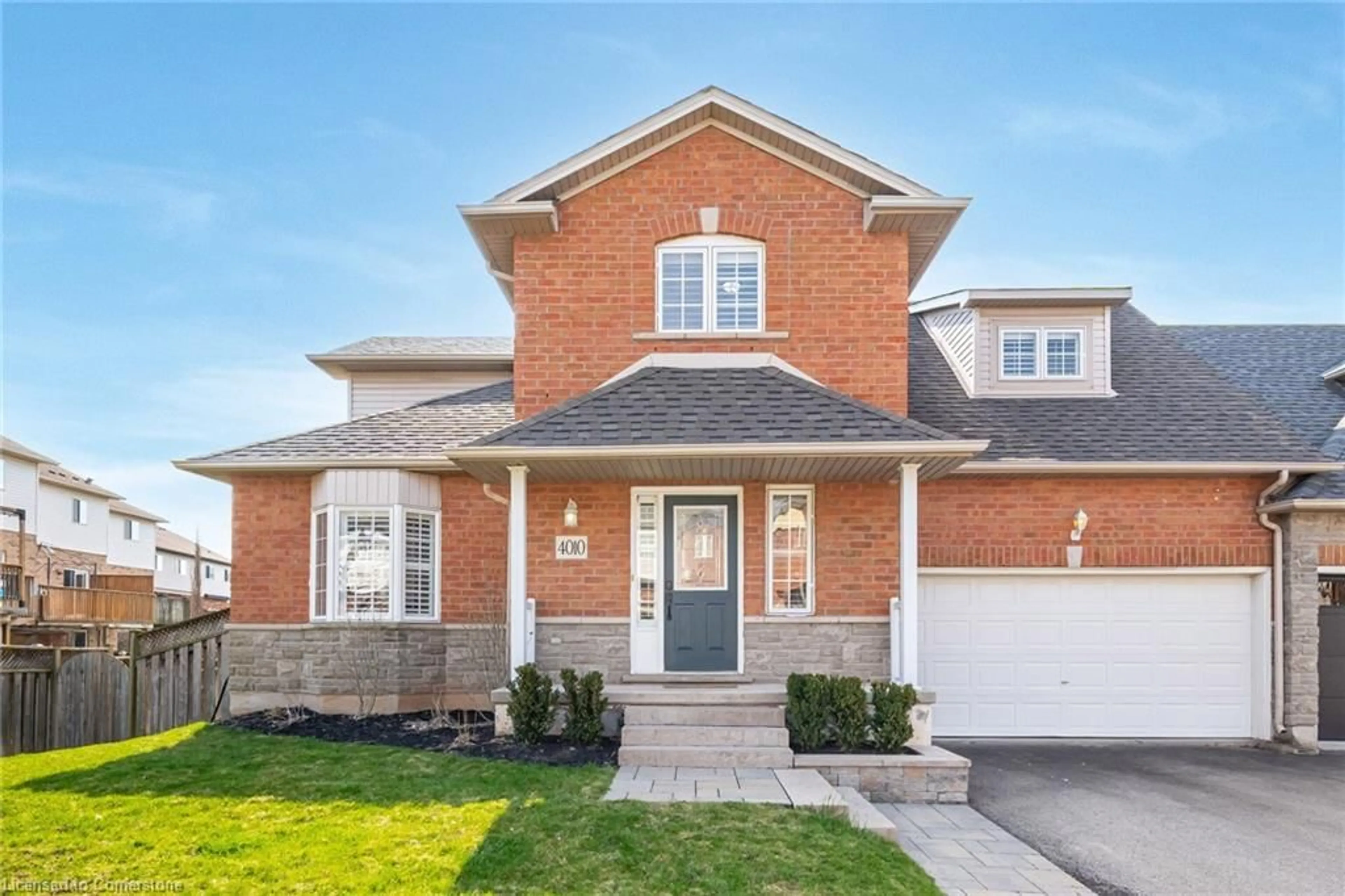 Home with brick exterior material, street for 4010 Medland Dr, Burlington Ontario L7M 4W7