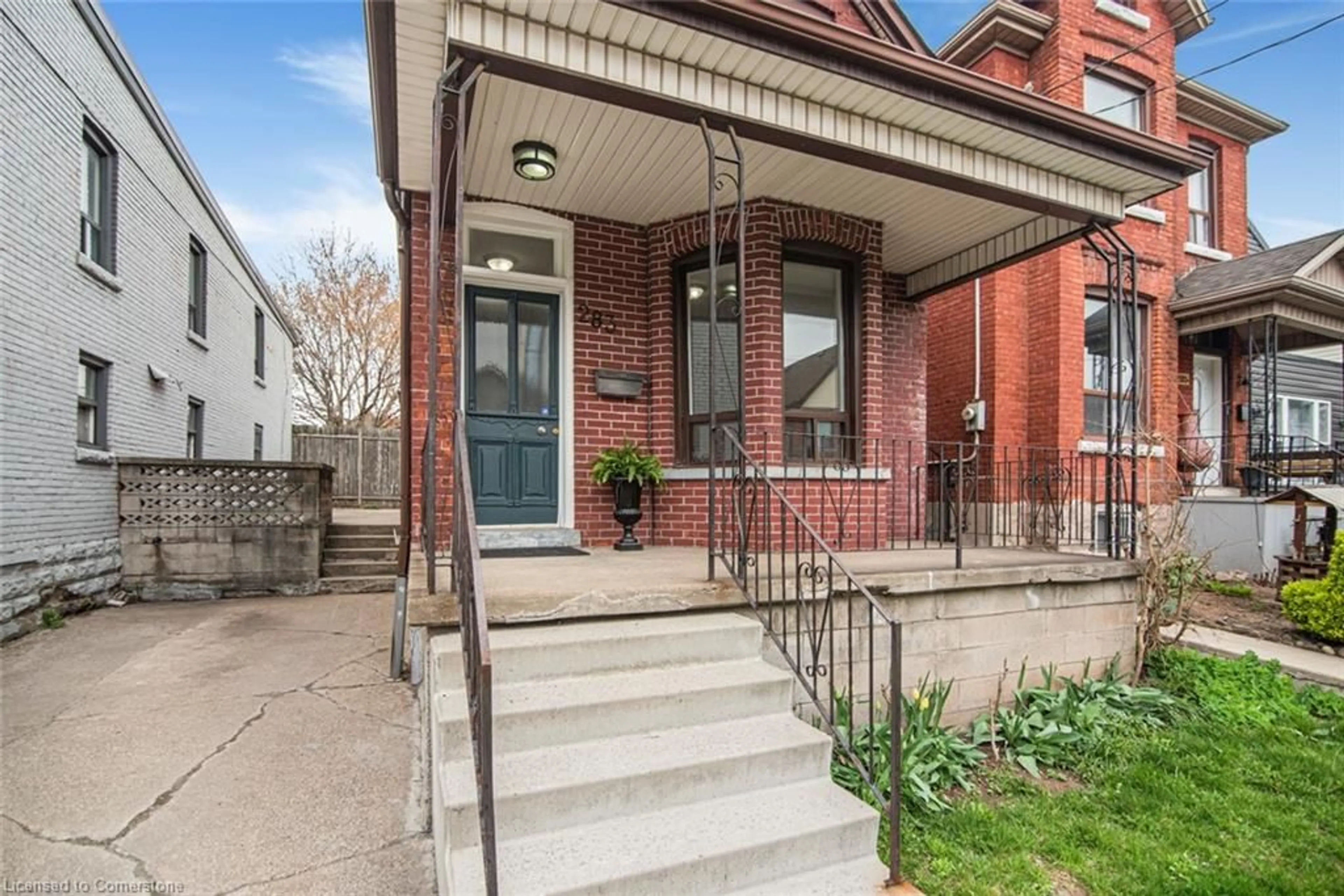 Home with brick exterior material, street for 283 Emerald St, Hamilton Ontario L8L 5L2