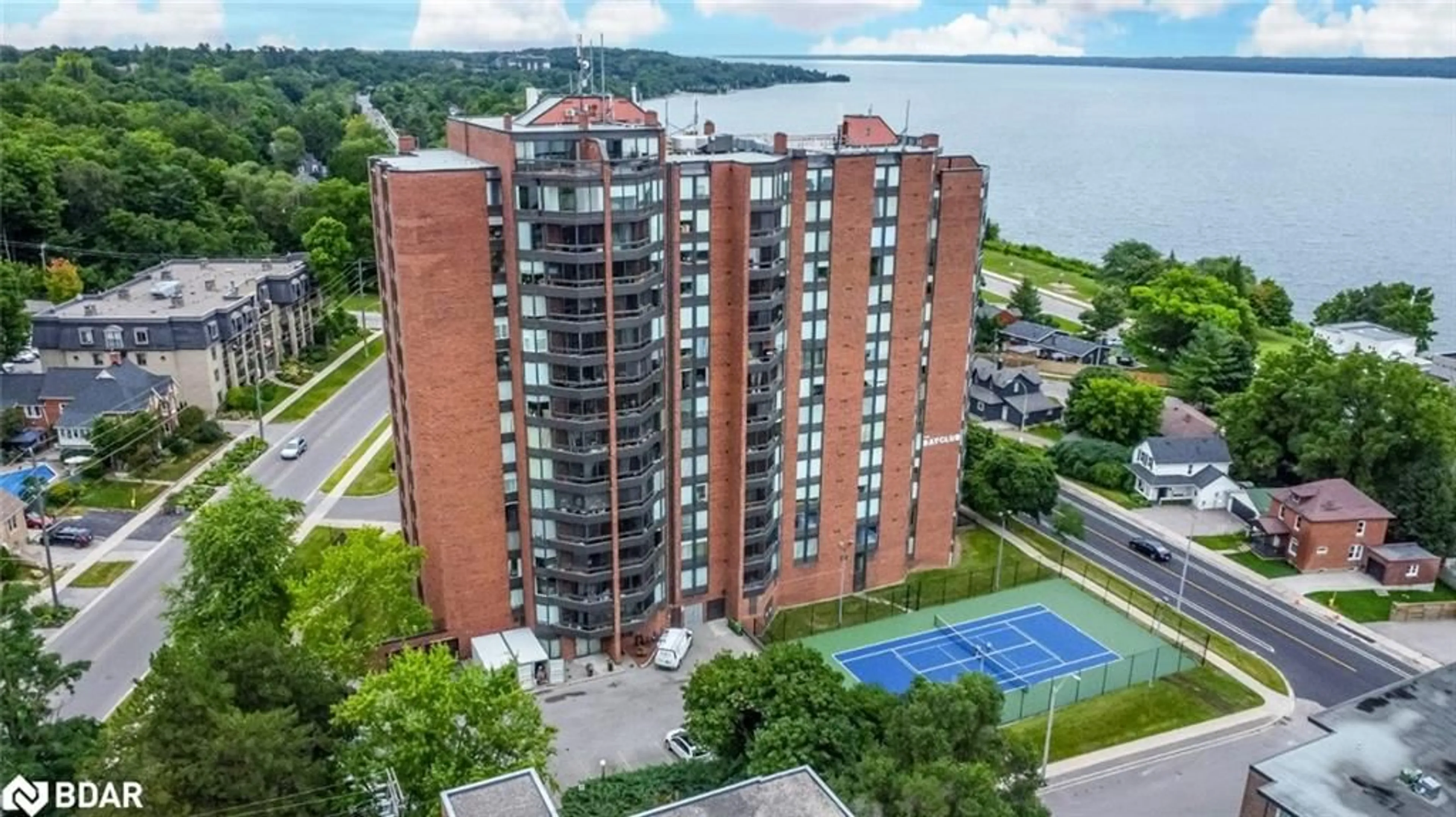 A pic from outside/outdoor area/front of a property/back of a property/a pic from drone, water/lake/river/ocean view for 181 Collier St #206, Barrie Ontario L4M 5L6